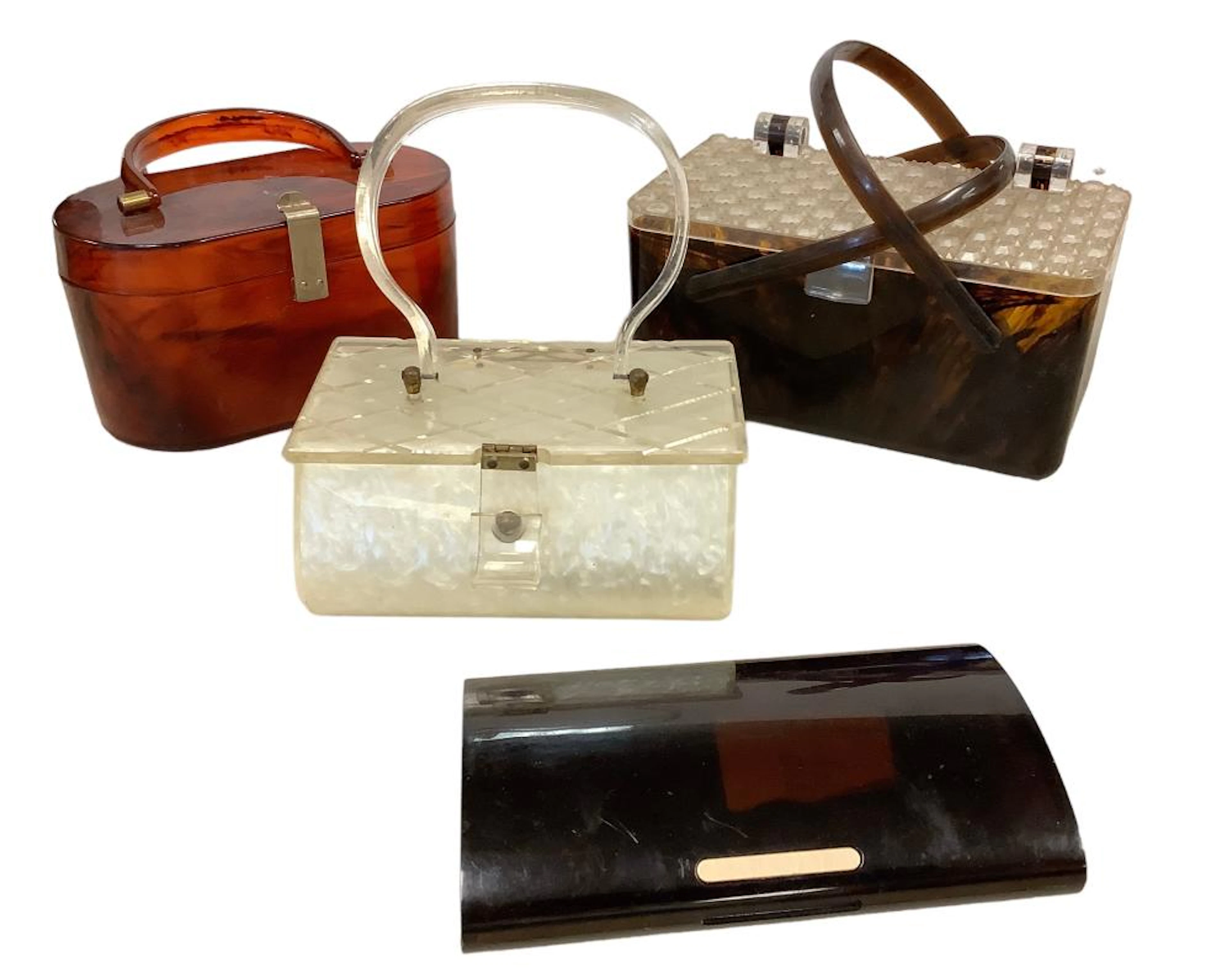 Four Vintage Plastic or Lucite Purses