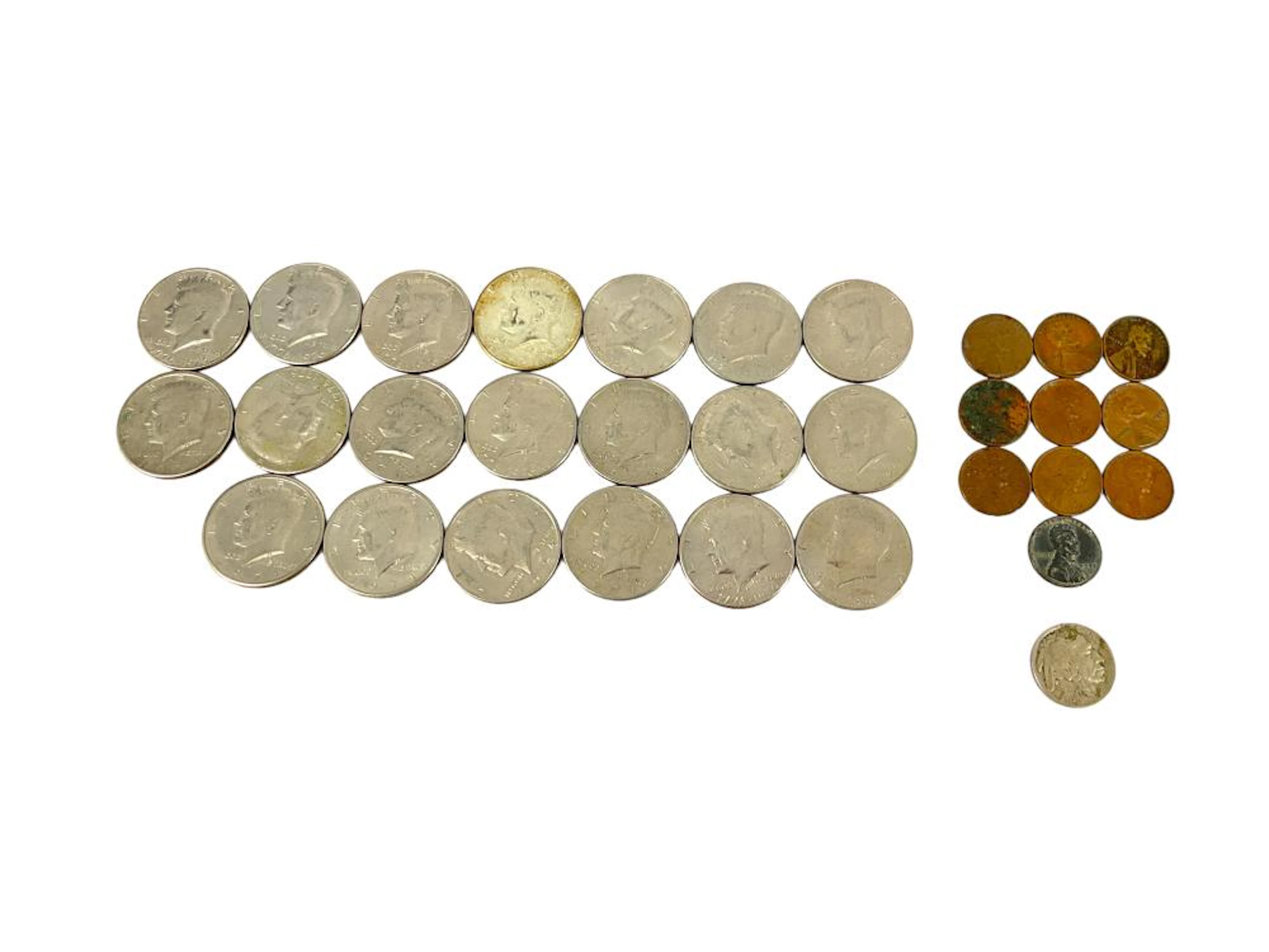 1 Nickel, 10 One-Cent Coins, and 20 U.S. Half Dollar Coins