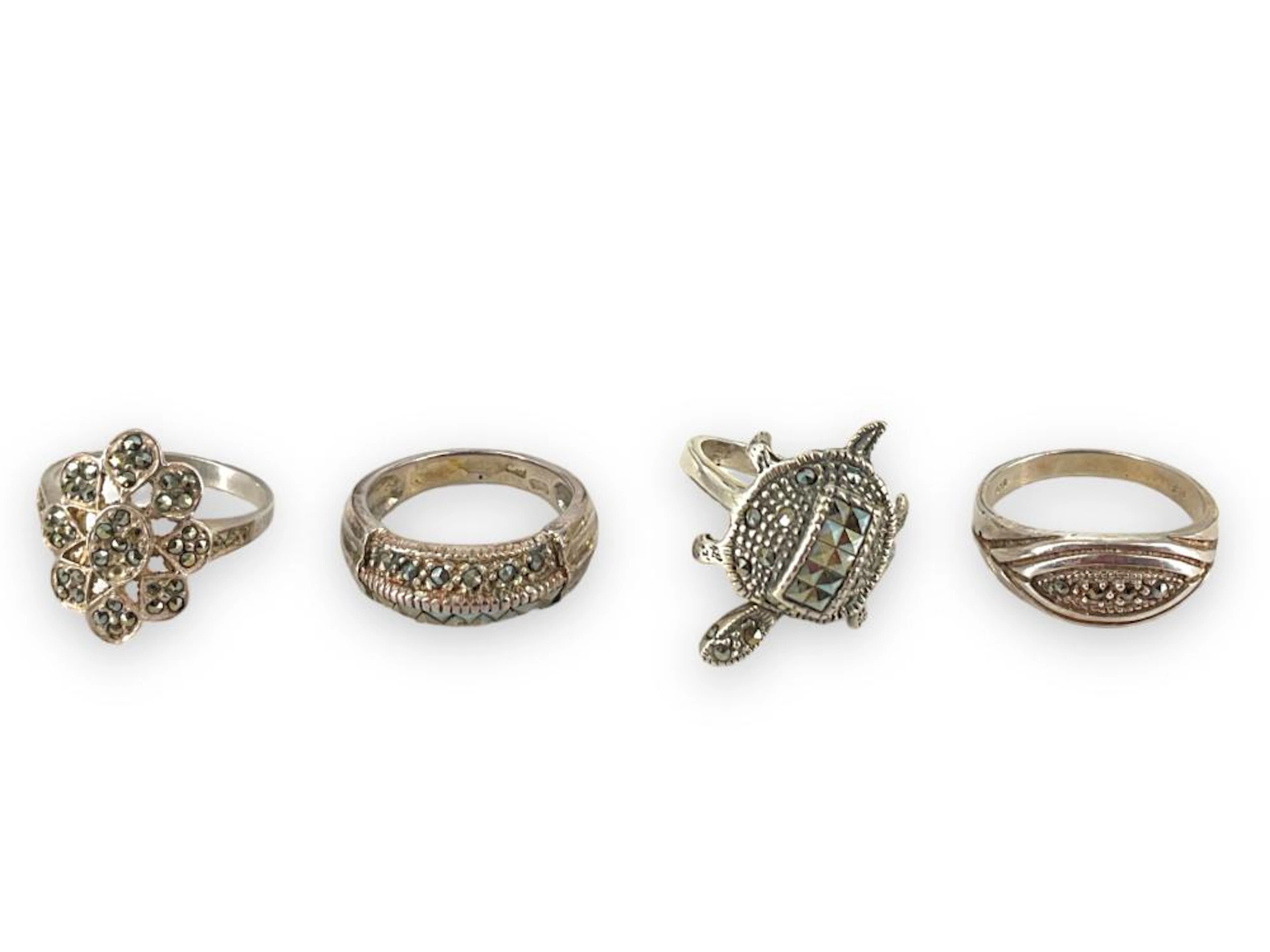 Four Sterling Silver and Marcasite Stone Rings