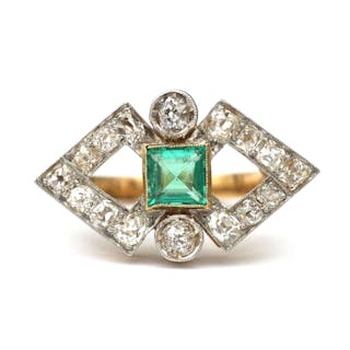 A 14 karat gold diamond and emerald Art Deco ring