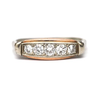A 14 karat white gold diamond ring