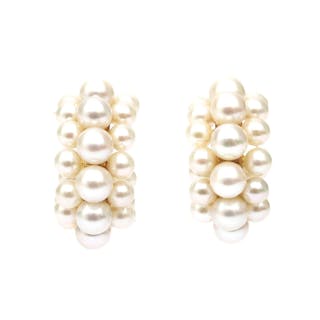 A pair of 14 karat gold pearl earrings