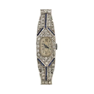 An Art Deco platinum ladies wristwatch with diamonds and sapphire ca. 1920