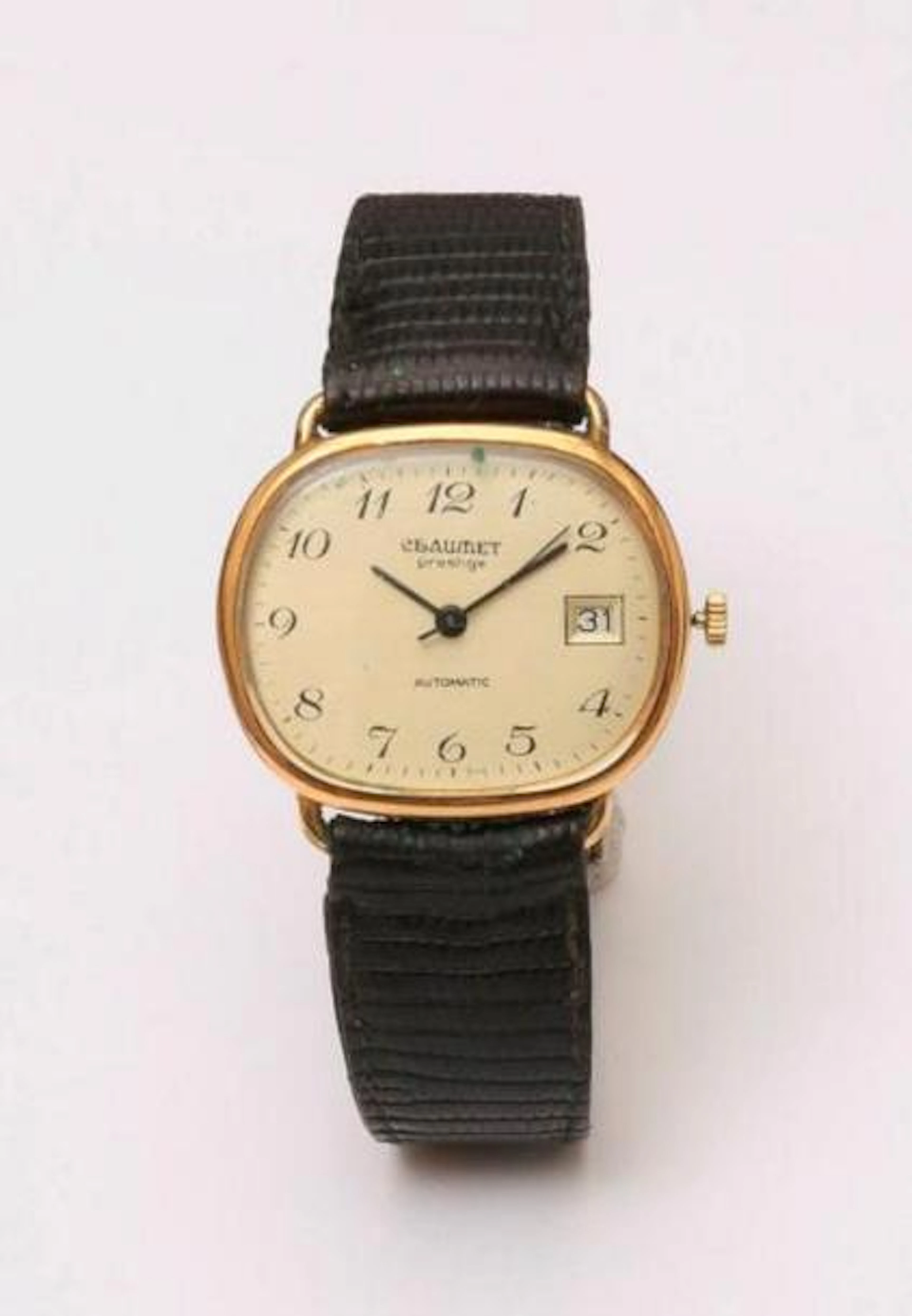 Montre bracelet automatique d'homme en métal à boitier oblong