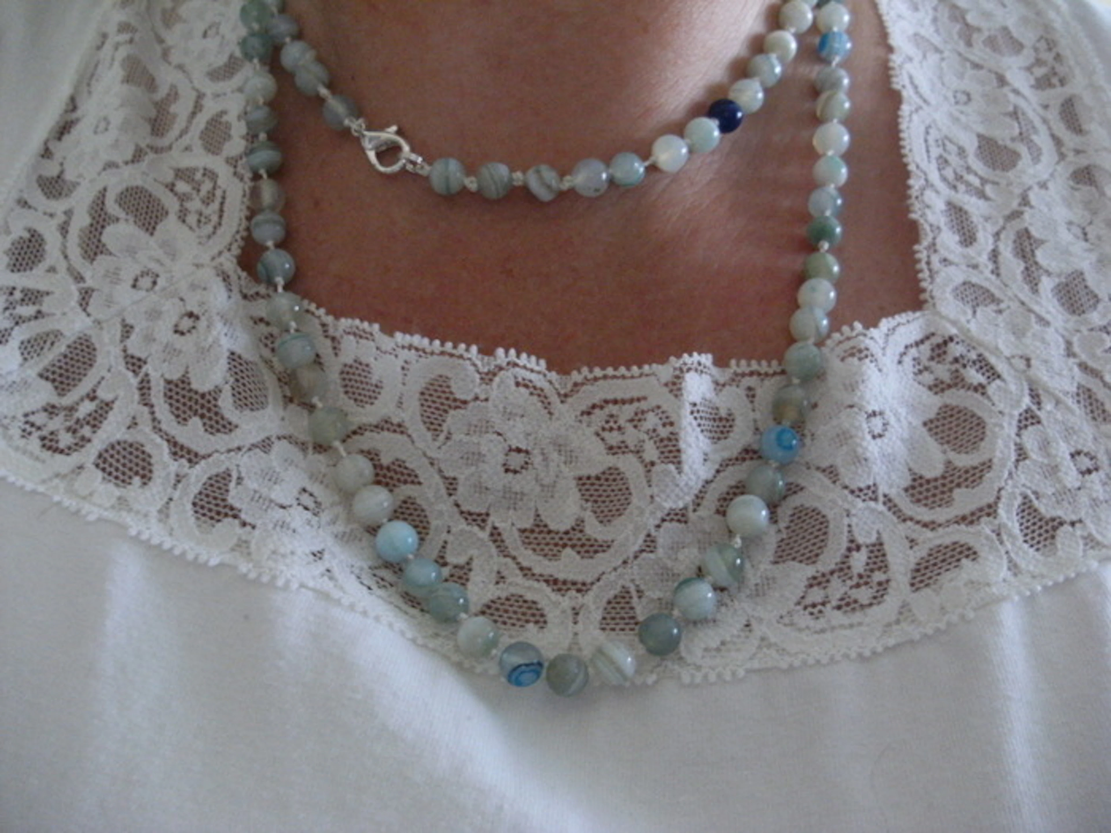 Necklace made of green striped agate beads, about 6mm, 94 cm long.