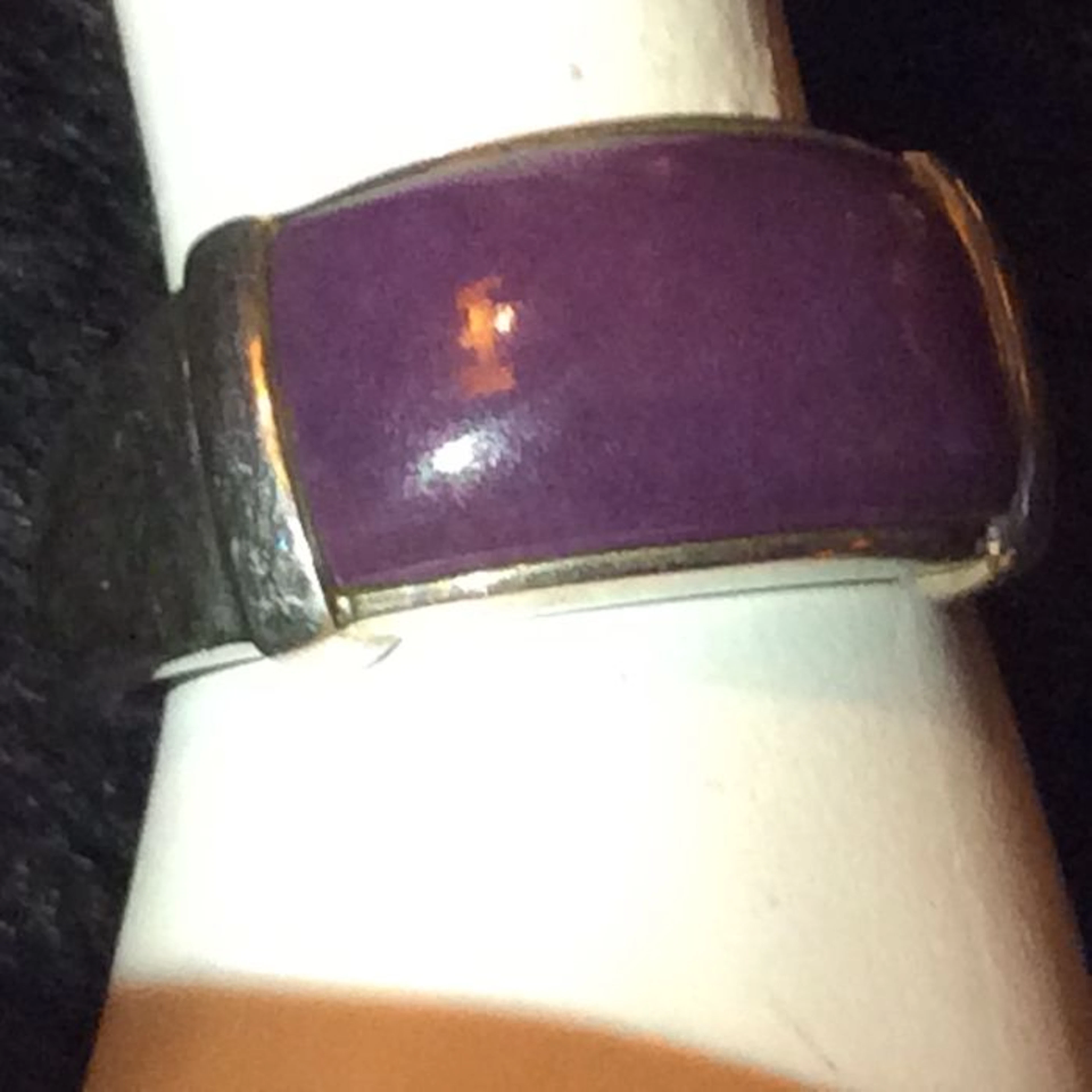 Silver ring, set with a convex, rectangular, blue-purple Lepidolite gemstone.