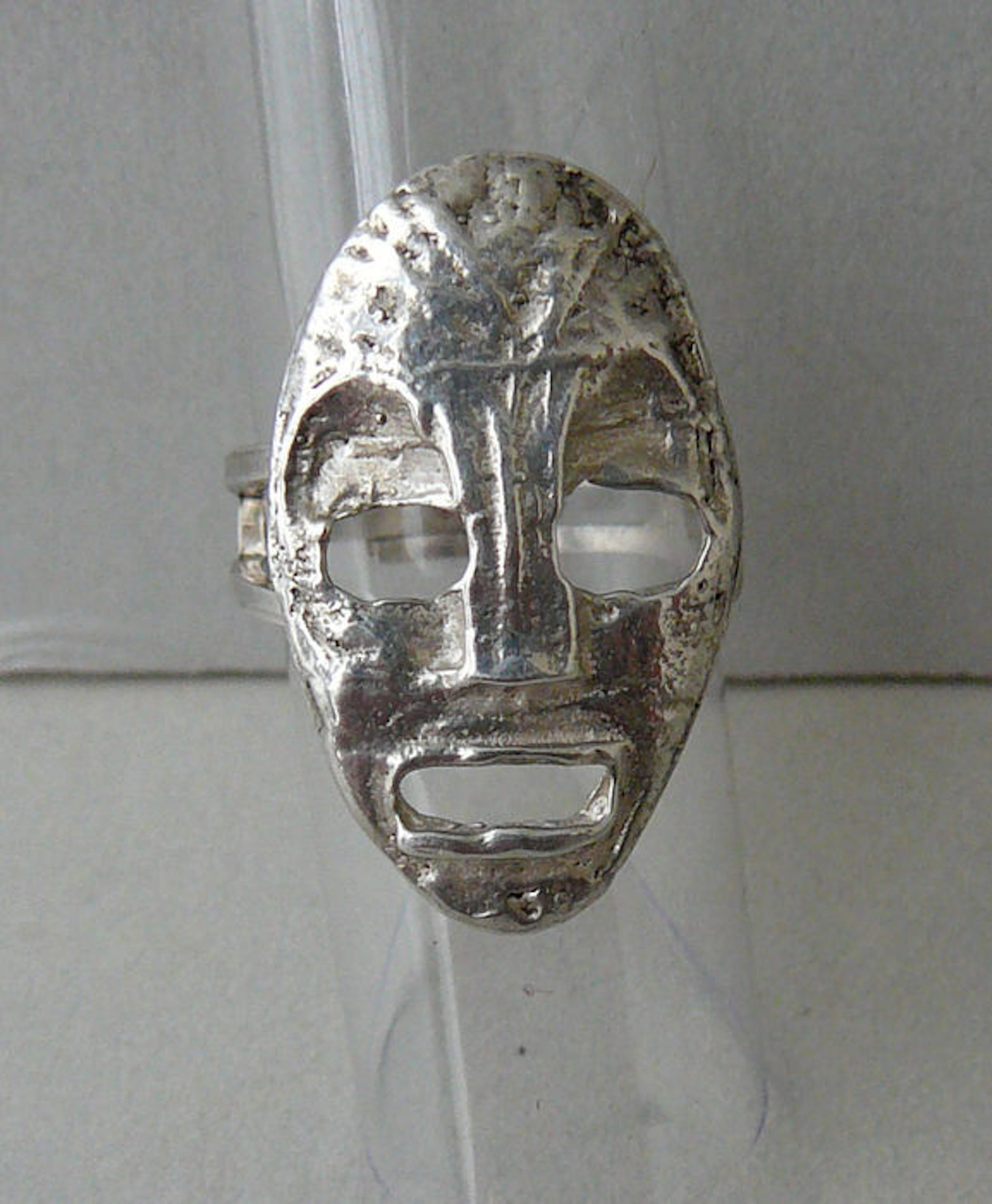 silver design mask ring