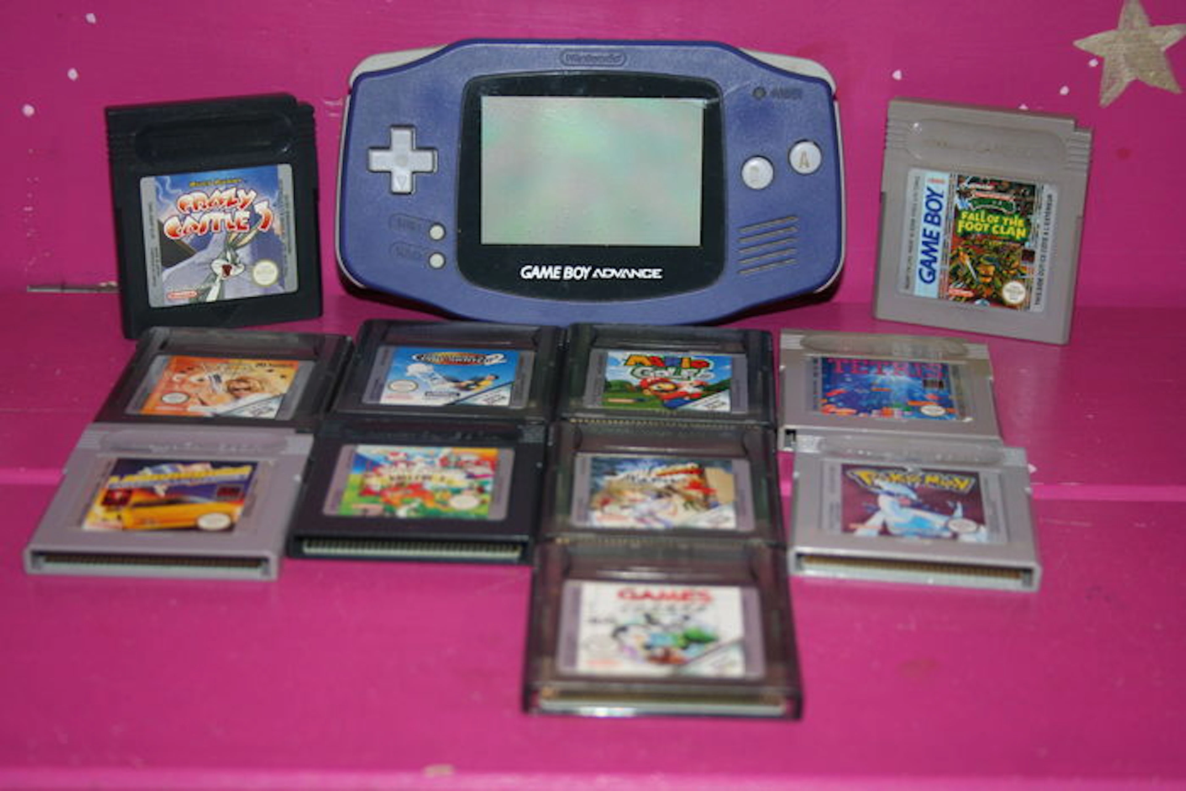 Gameboy Advance inclusief 11 spellen o.a turtles, pokemon en street fighter