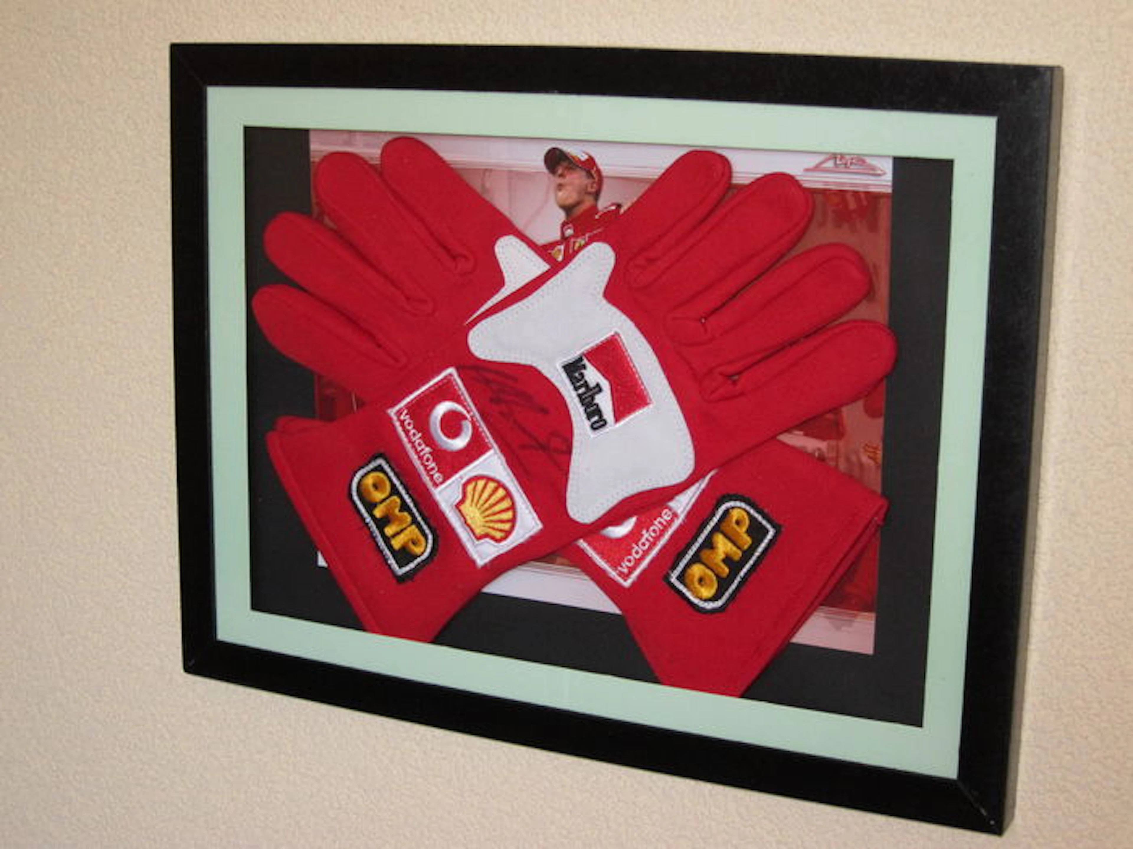 Michael Schumacher set of Ferrari racing gloves original signature, framed in 3D case + COA