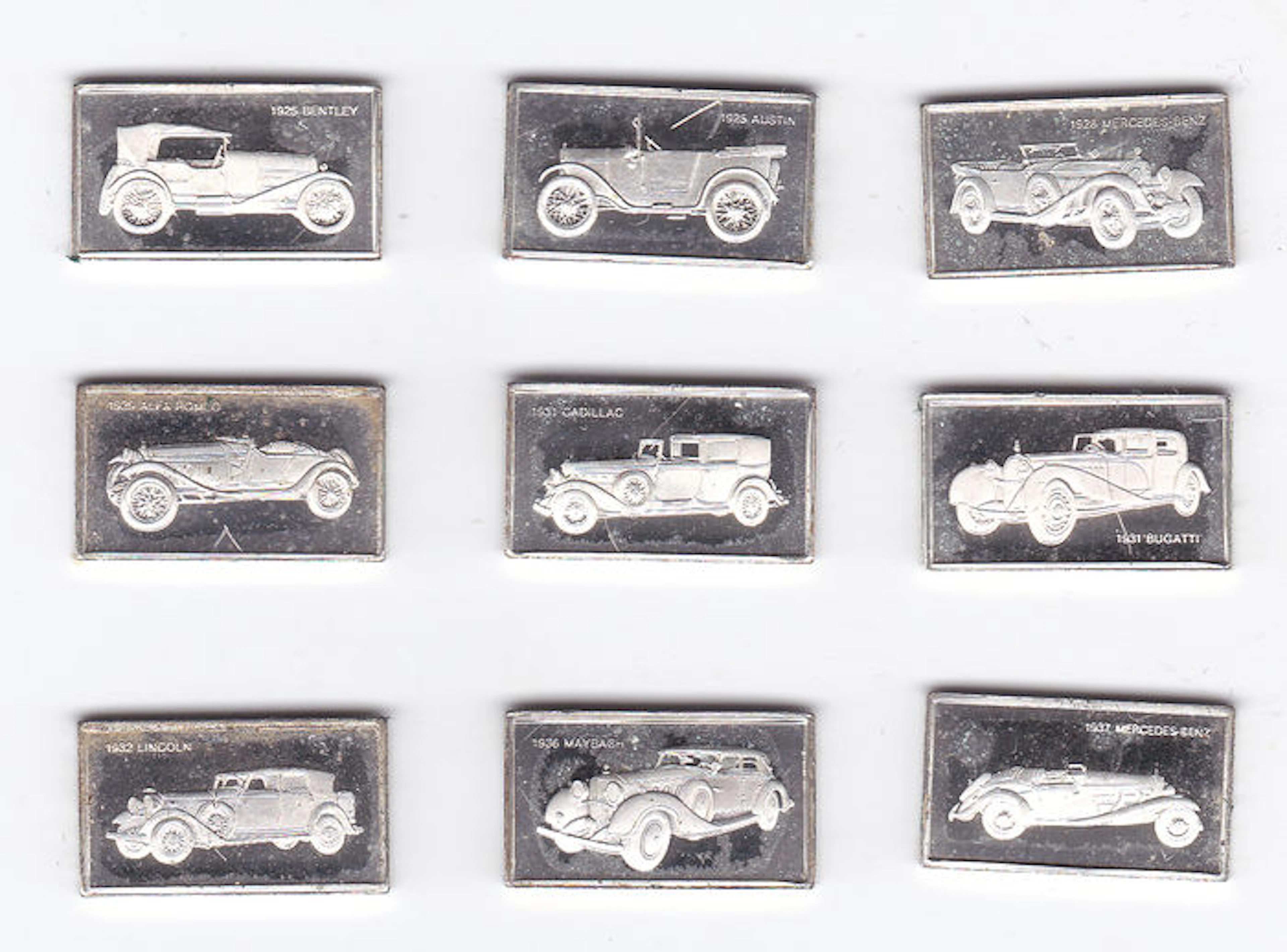 Zilveren plaquettes (9 stuks) van oldtimers 1925-1937
