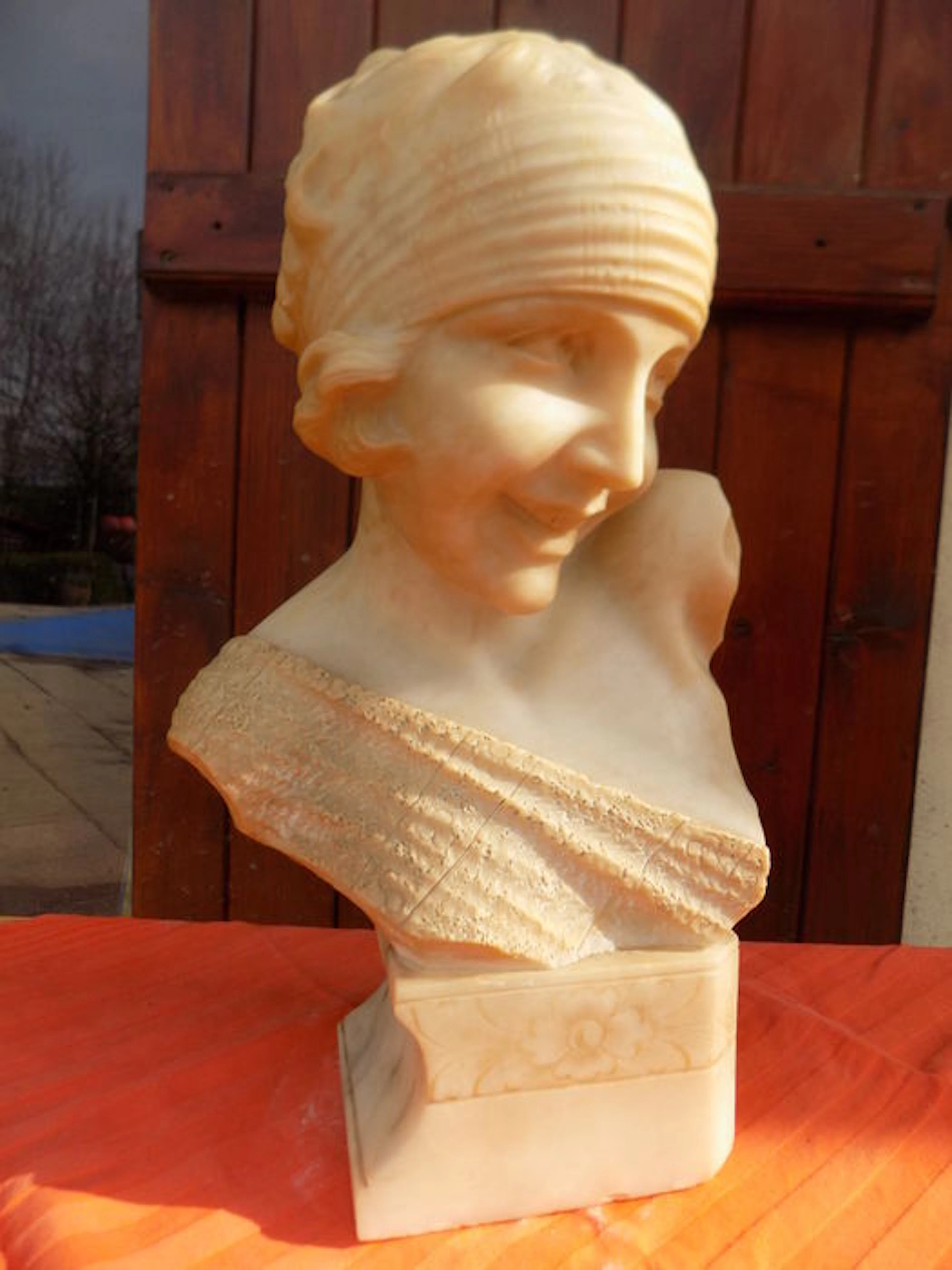 Pineschi - marble bust of a cheekily laughing girl
