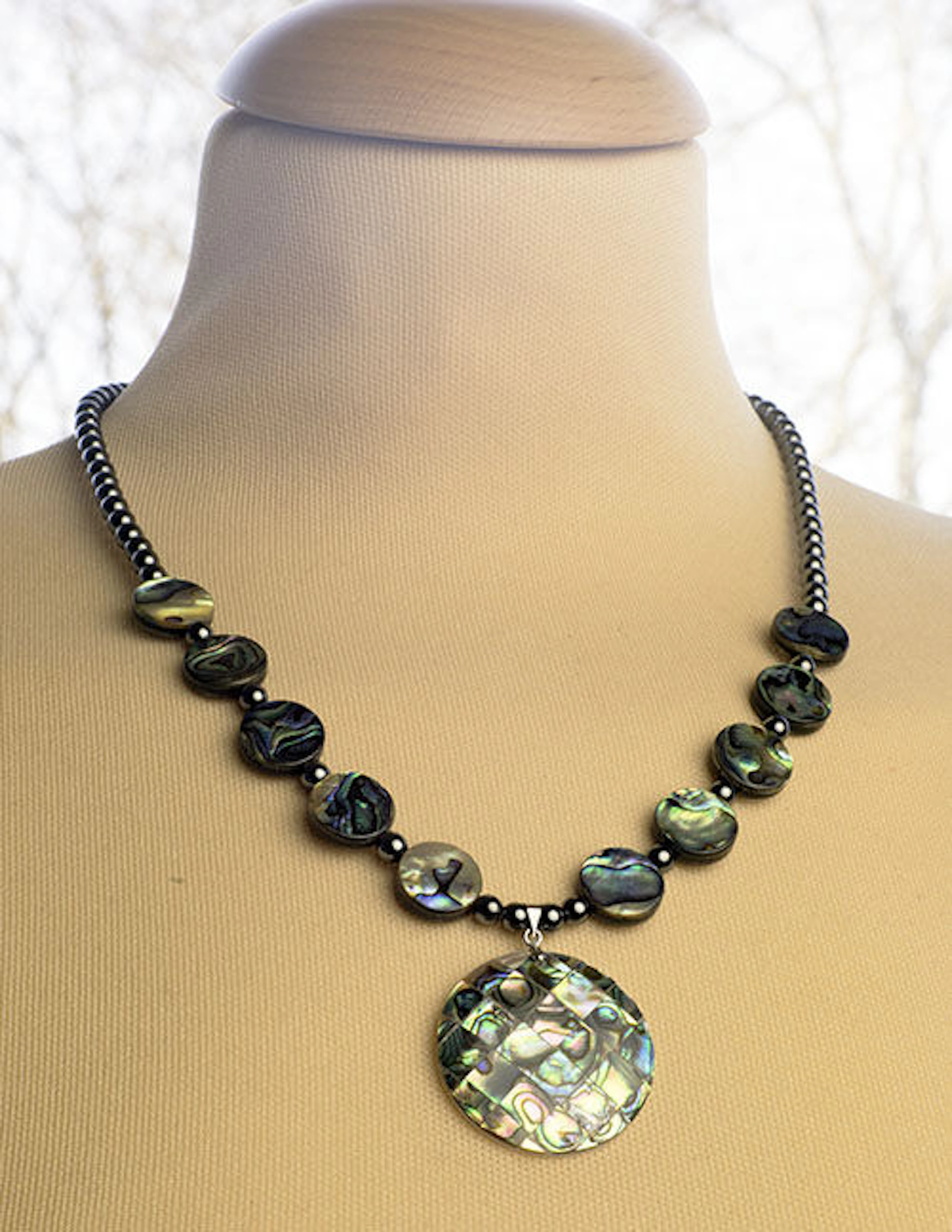 Abalone shell necklace with black tungsten stones with sterling silver fittings