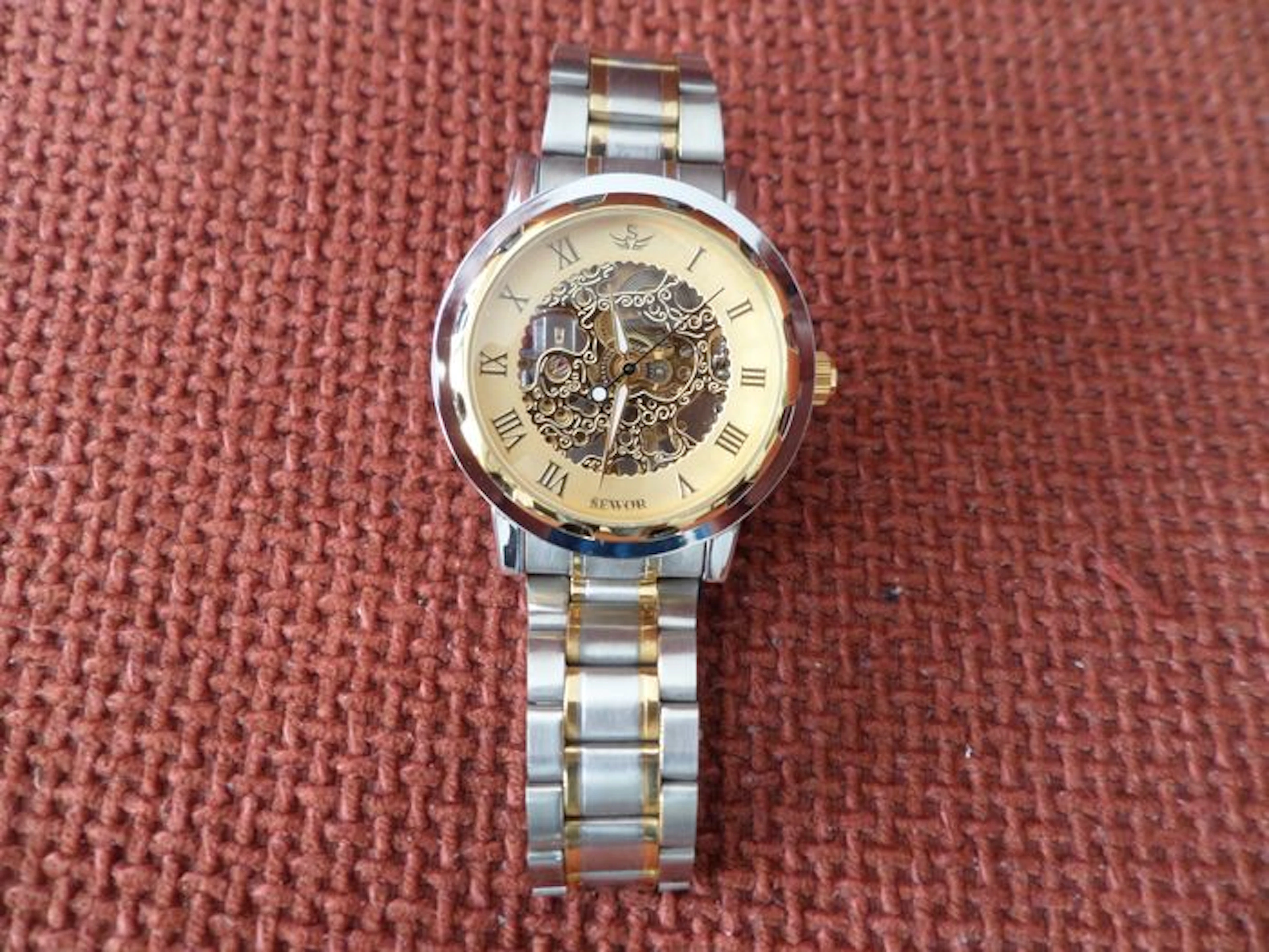 Three wristwatches in excellent condition.