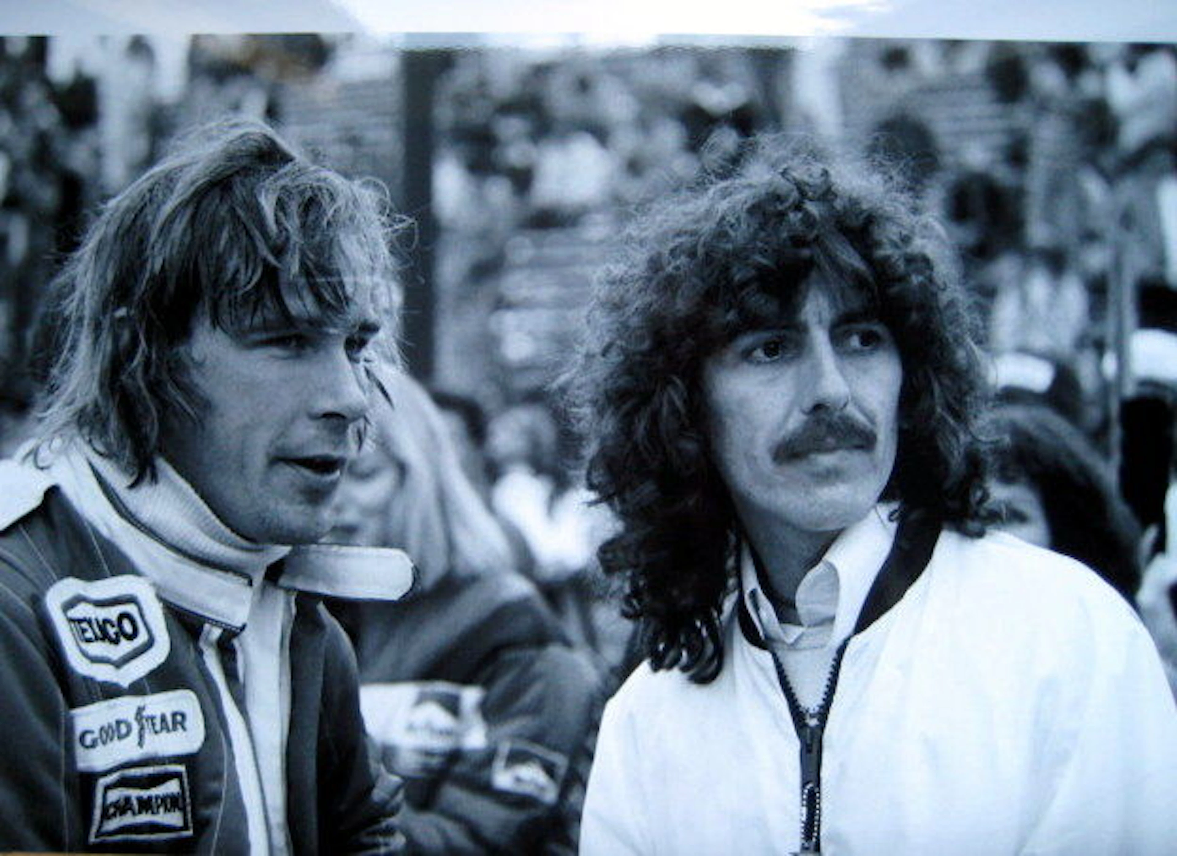 Photo : (L to R): Seventh placed James Hunt (GBR) with F1 celebrity fan George Harrison (GBR) Beatles guitarist. United States Grand Prix (West), Rd 4, Long Beach, USA, 3 April 1977