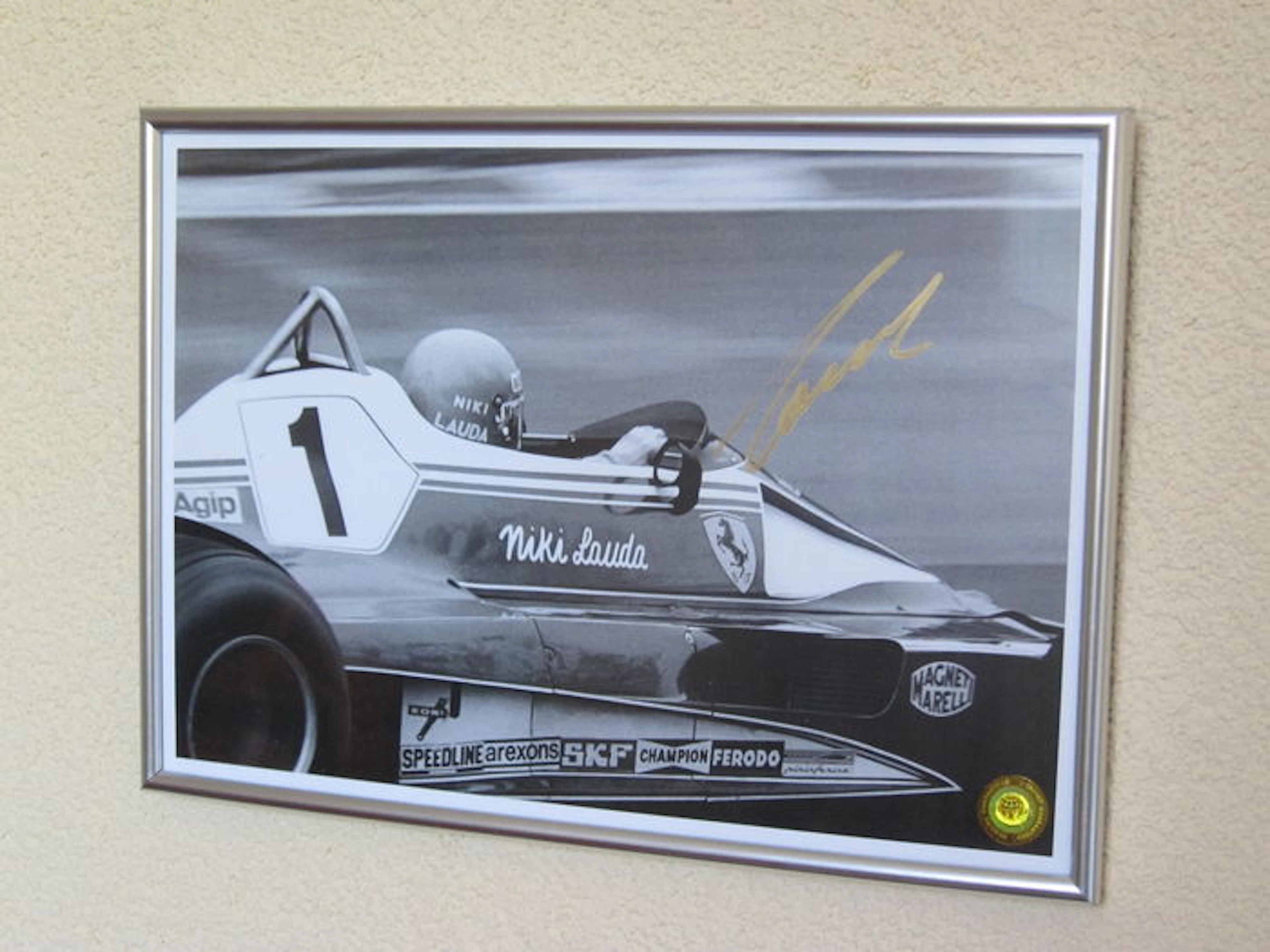 Wereldkampioen - Formule 1 - 1975 1977 1984 - Origineel gesigneerde ingelijste foto Niki Lauda + COA.