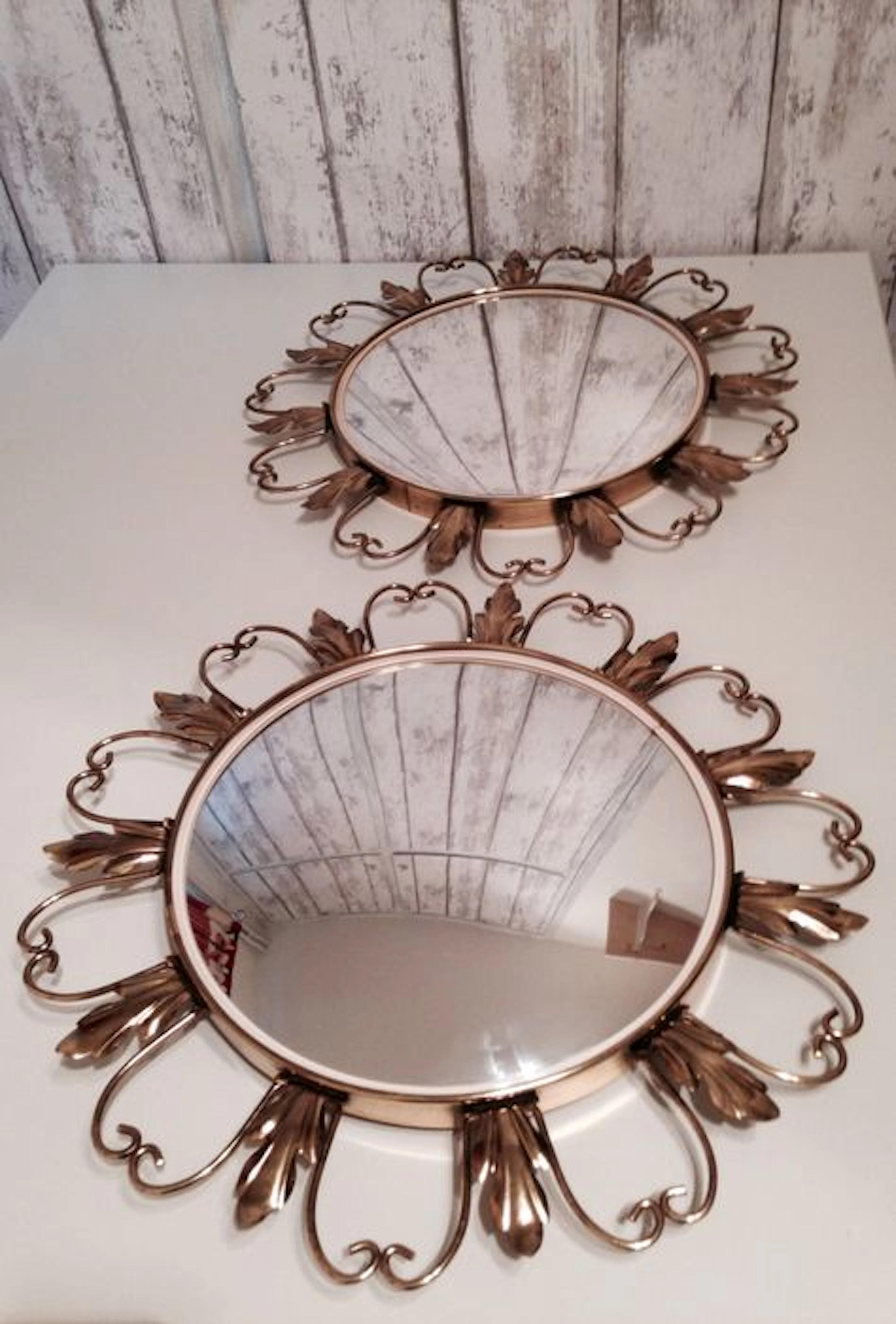 Twee vintage bolle zonnespiegels