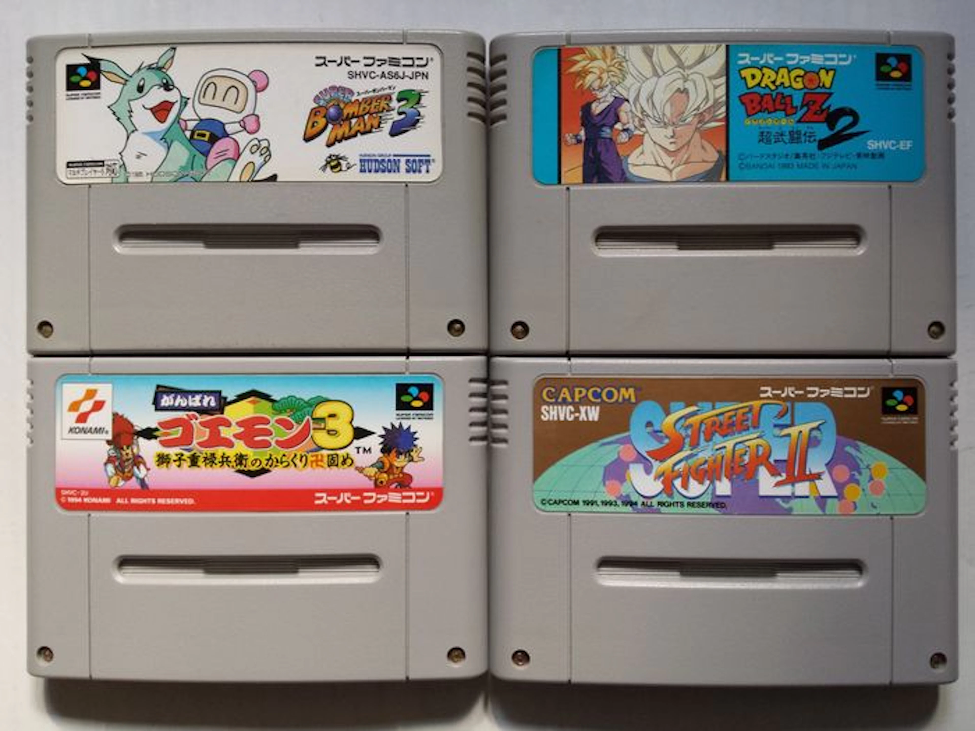 Lot of 4 games for the Super Nintendo (Japanese imports): Super Bomberman 3, Super Street Fighter II, Dragon Ball Z Super Butouden 2, Ganbare Goemon 3