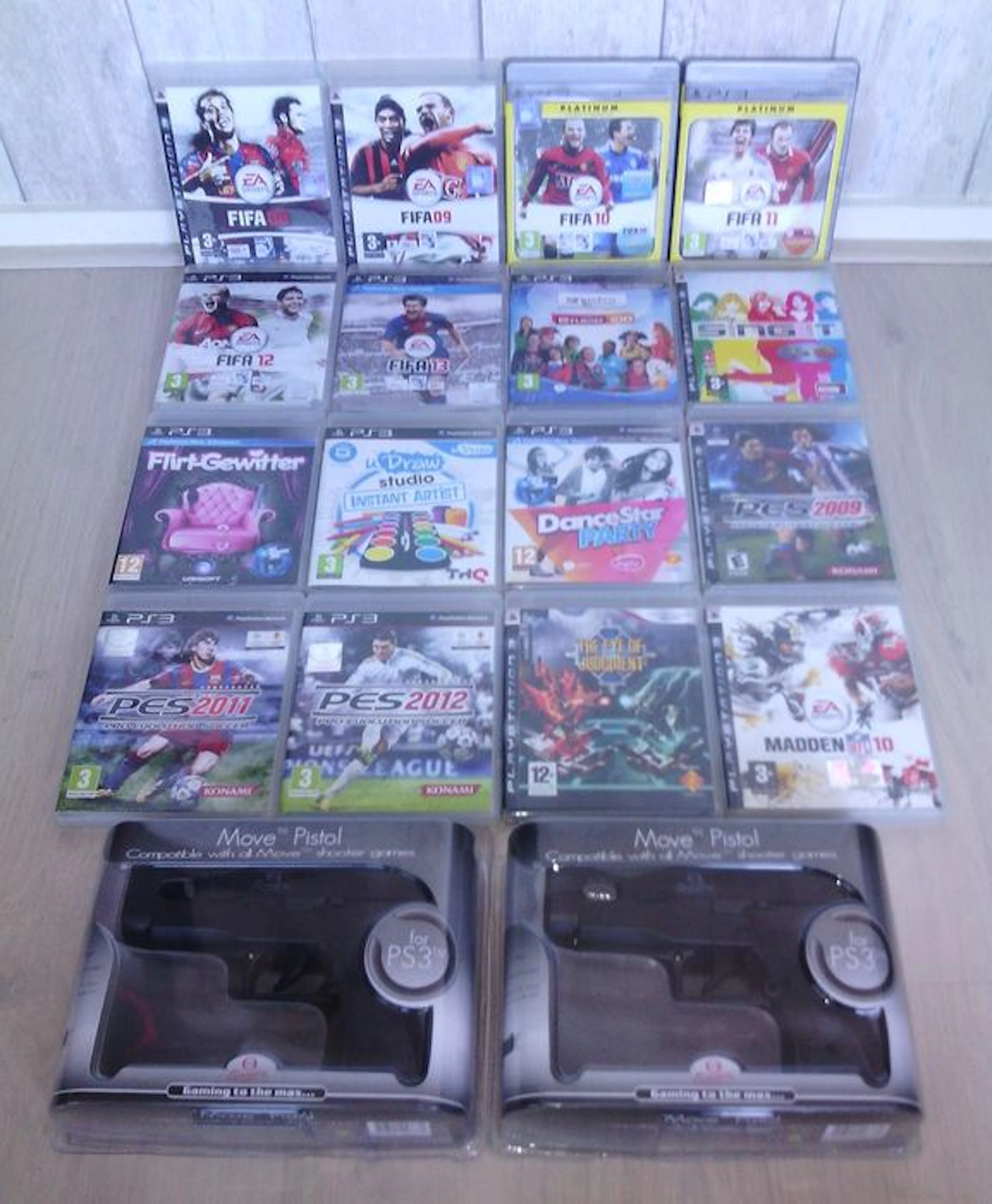 Lot van 16 Playstation 3 games + 2 PS Move Pistolen