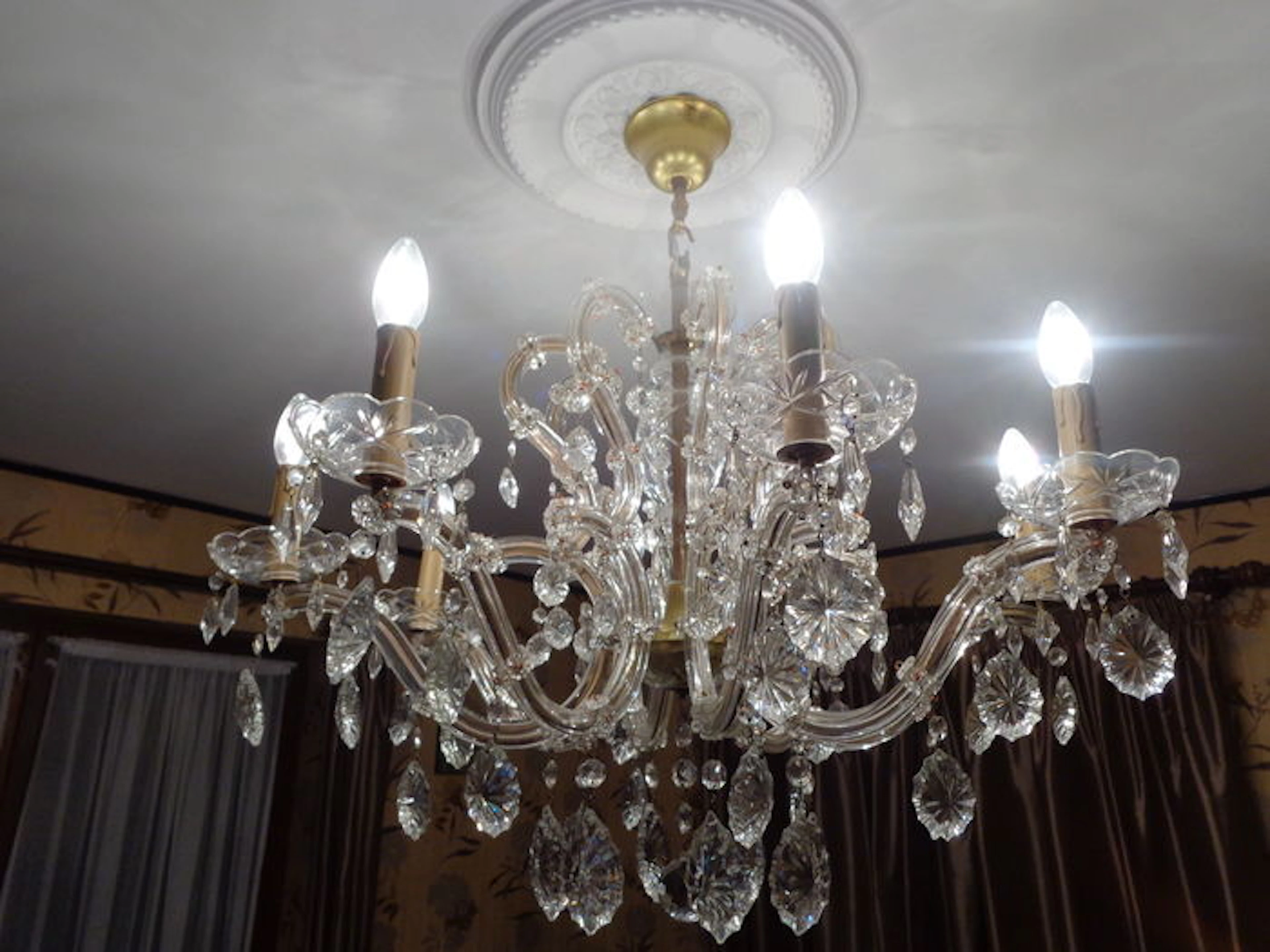 8-arm chandelier with crystal ornamental droplets - arms with iron and copper