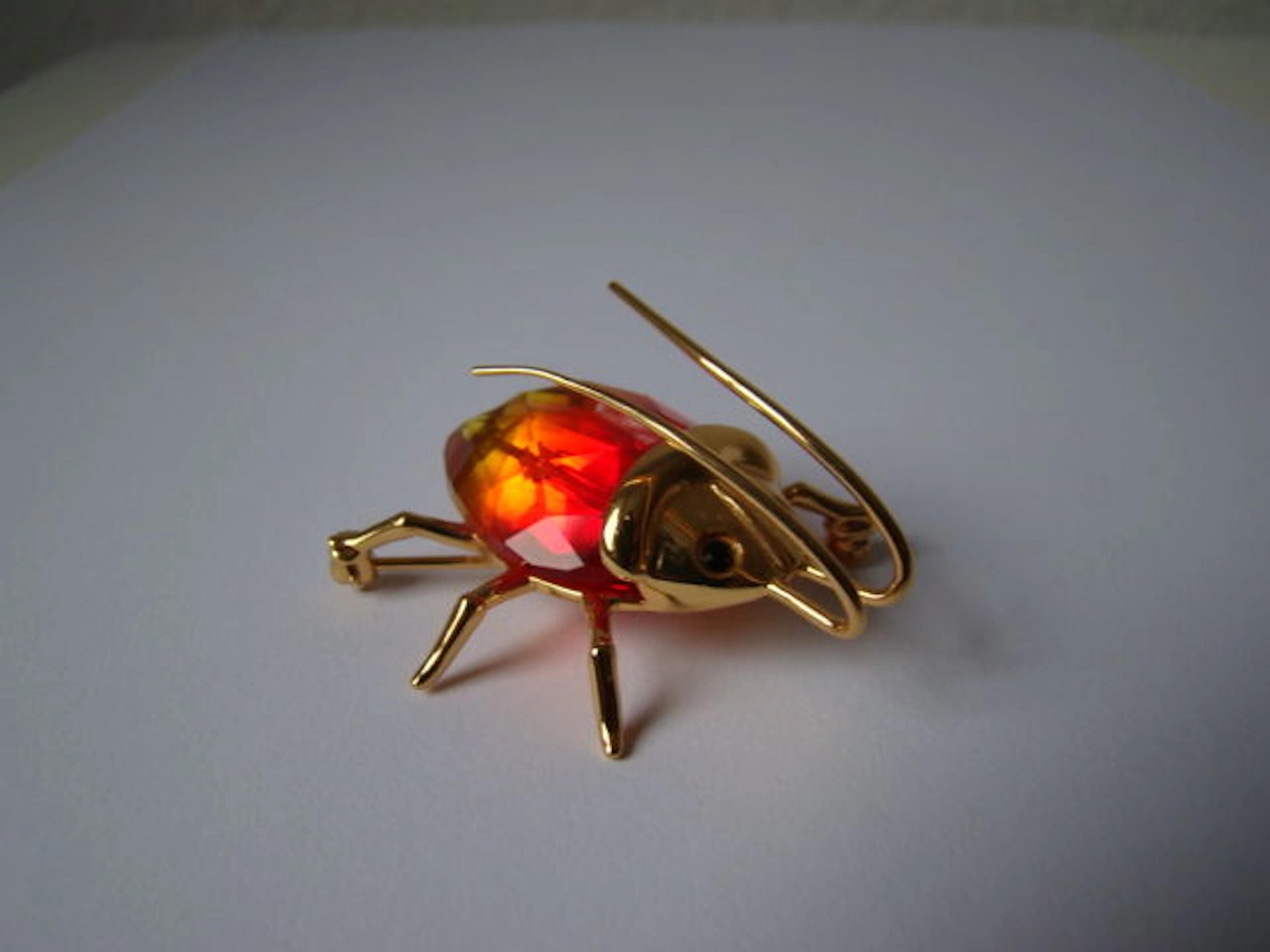 Daniel Swarovski - vergulde zilveren kever broche