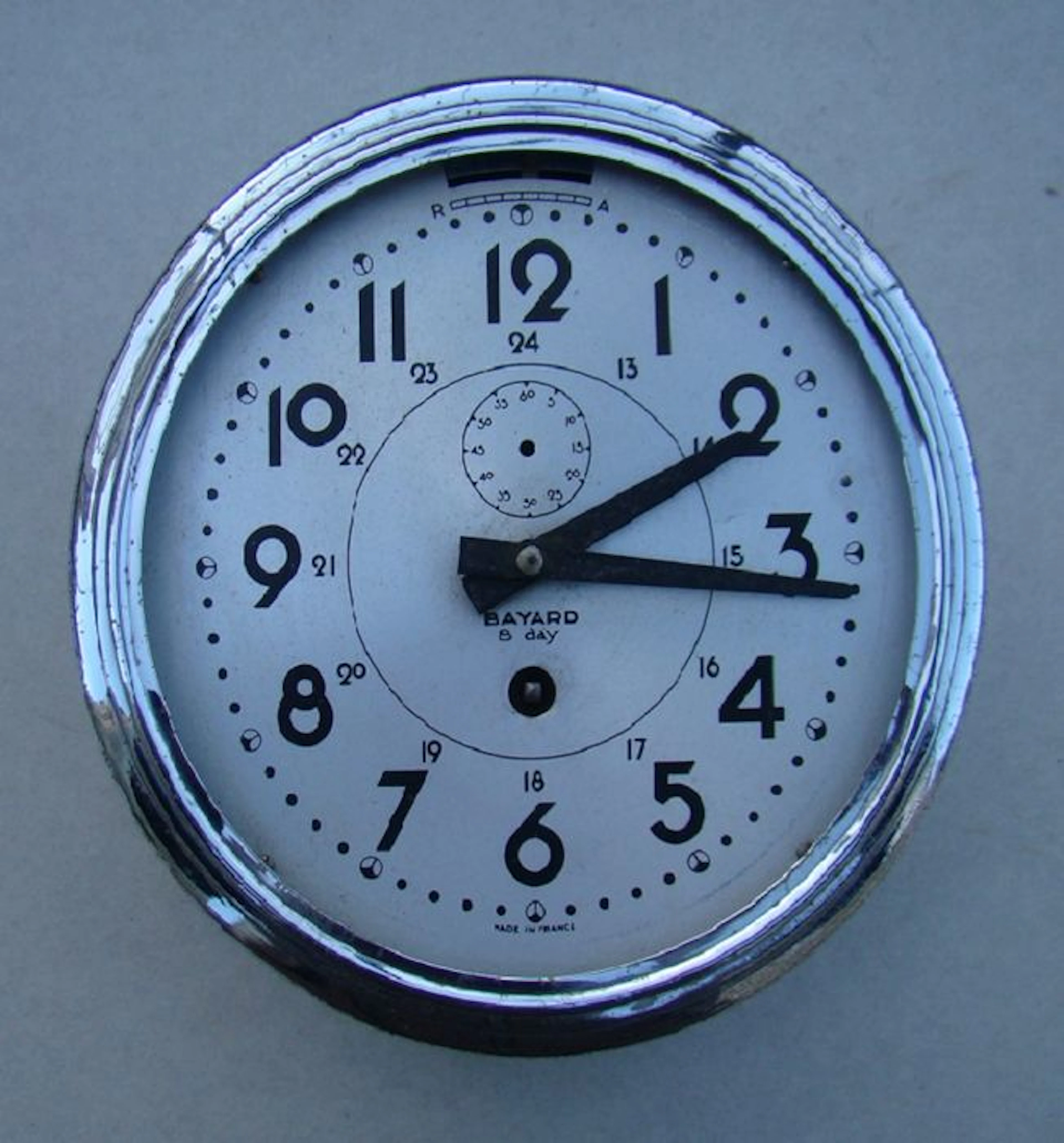 Ancienne horloge pendule de marine en inox