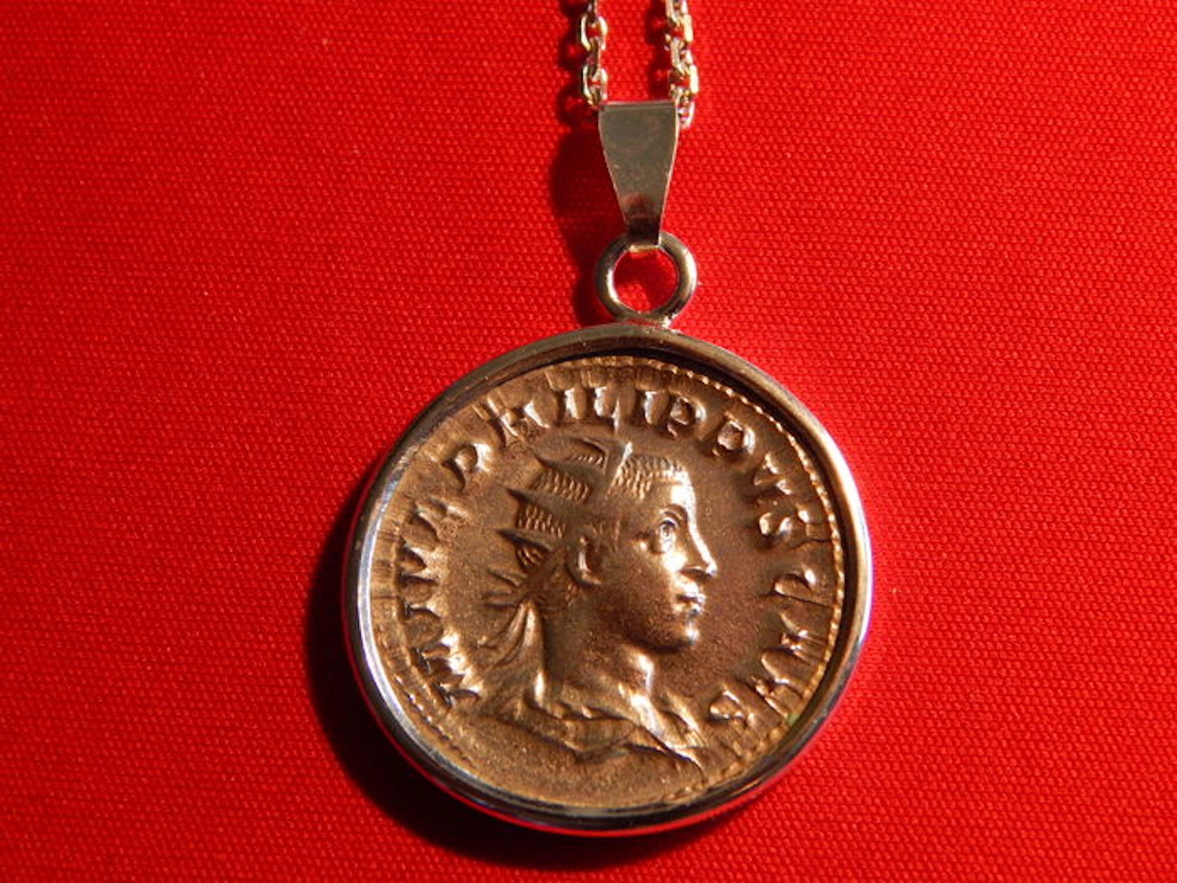 Silver necklace with an original silver coin of Philipp II