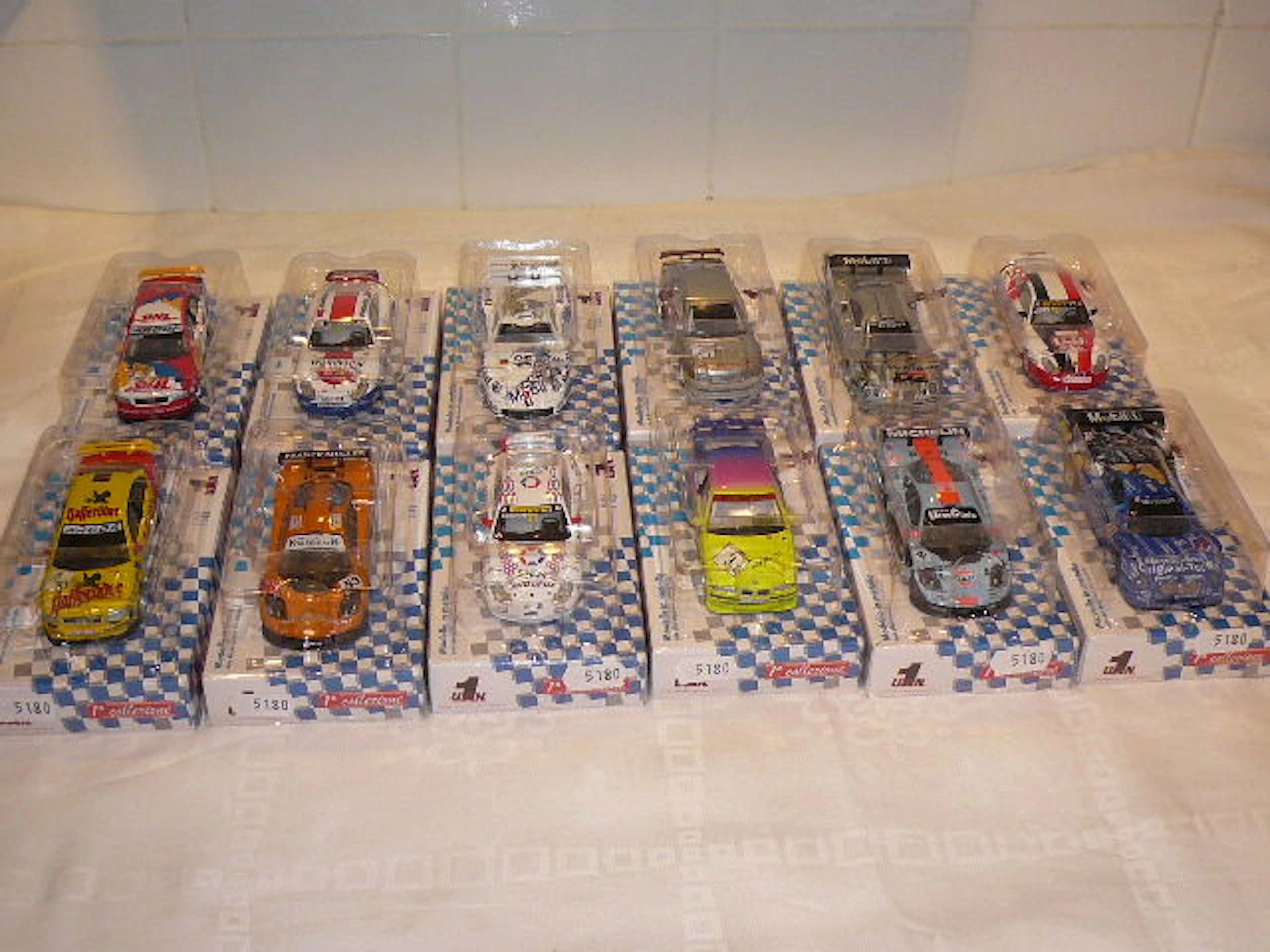 U.A.N. 1a Collezione - Schaal 1/43 - Kavel met 12 modellen: 3x Audi, 4x Porsche, 3x BMW en 2x Mercedes-Benz