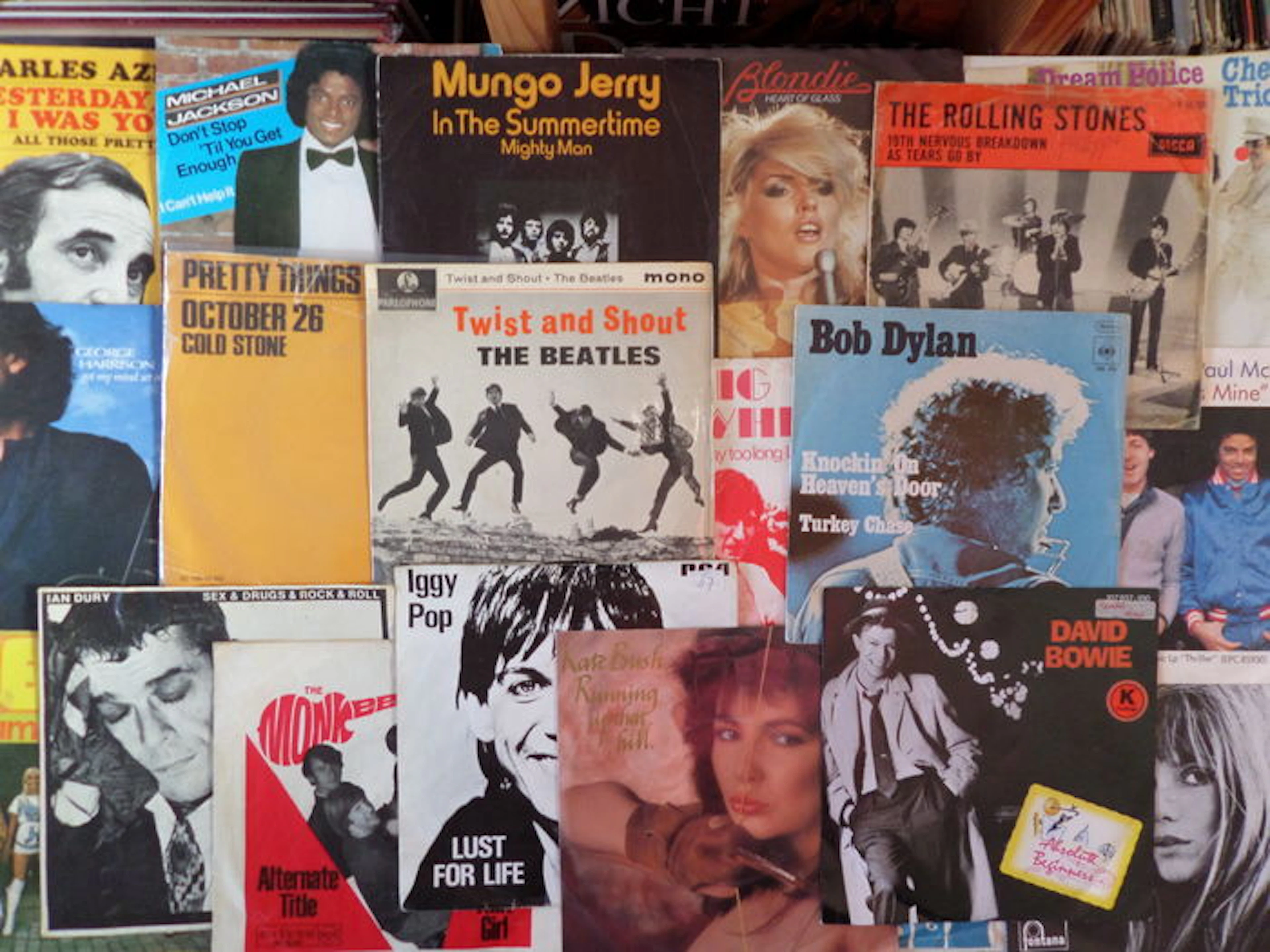 Lot of 50 7” singles from the 60's, 70's and 80's in VG+/EX condition.
