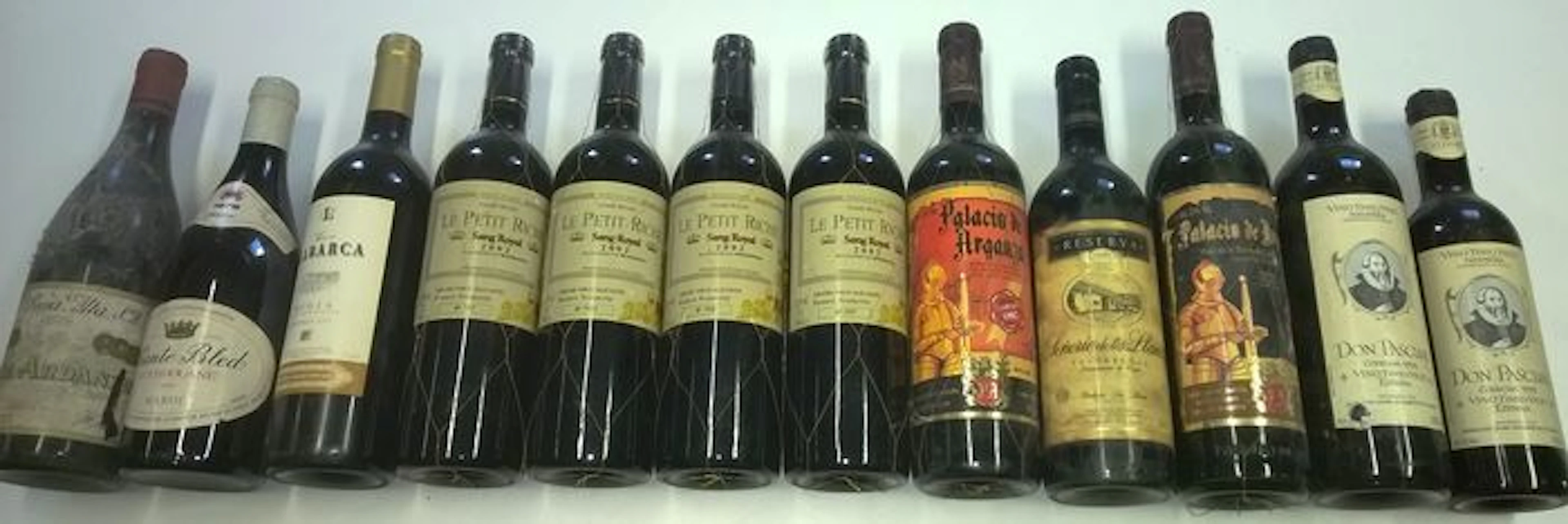 1973 - La Rioja Alta Vina Ardanza, 1 bottle - 1978 Chante Bled Guerrouane Maroc, 1 bottle - 2003 Labarca Rioja, 1 bottle - 2002 Le Petit Riche Sang Royal, 4 bottles - 1982 Palacio de Arganza Leon