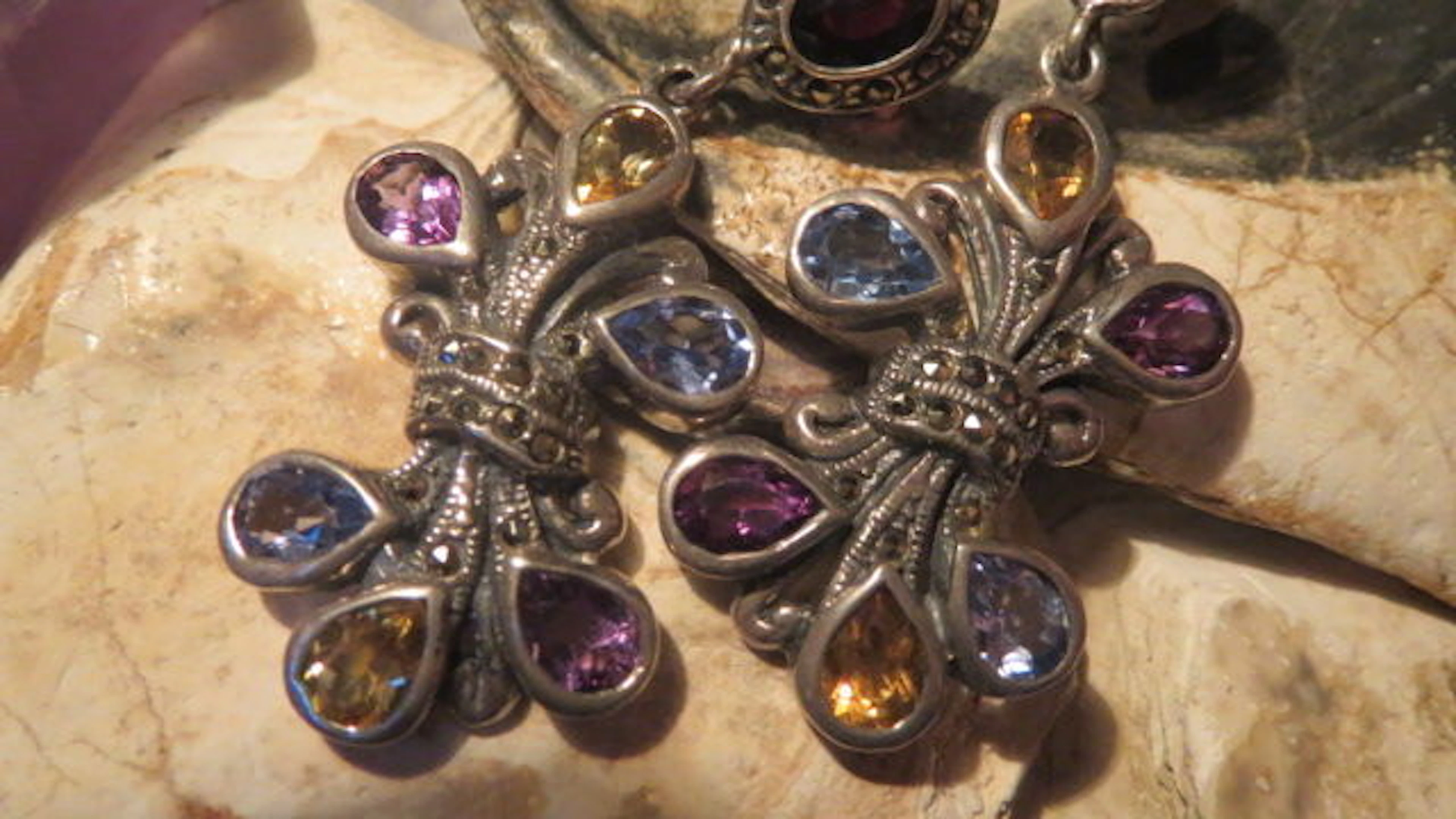 Silver dangle earrings set with aquamarine, citrine, amethyst, wine garnet & sparkling marcasites.