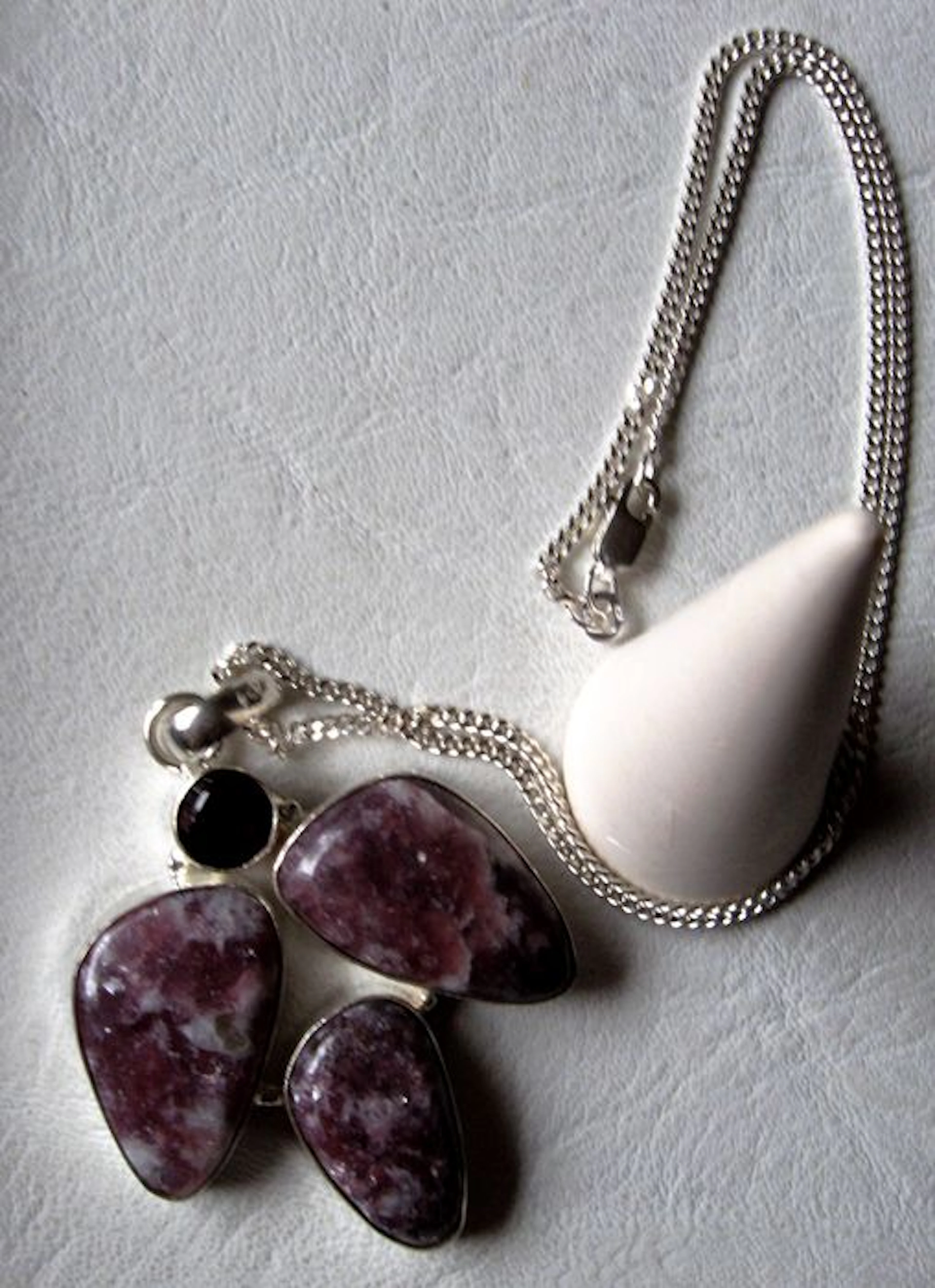 Large silver pendant with lepidolite and garnet on a silver necklace