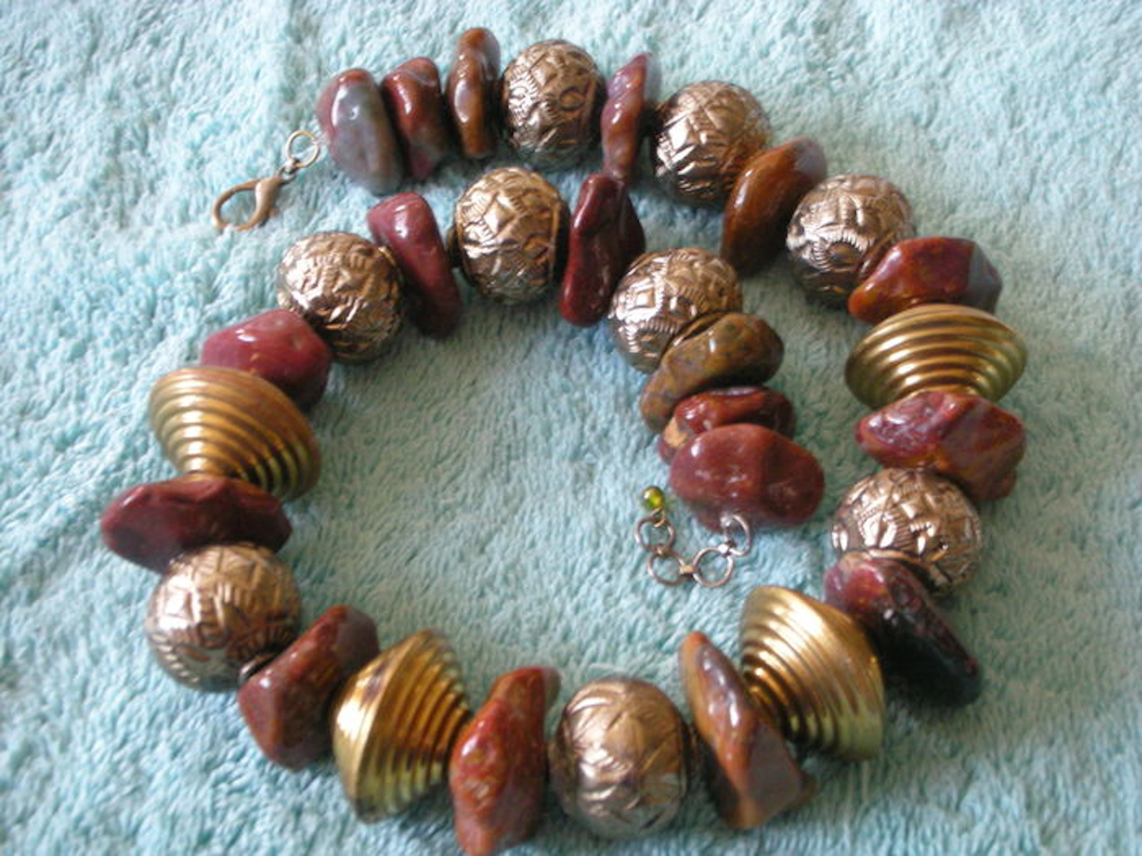 Agate necklace with silver plated mala and brass spherical beads.