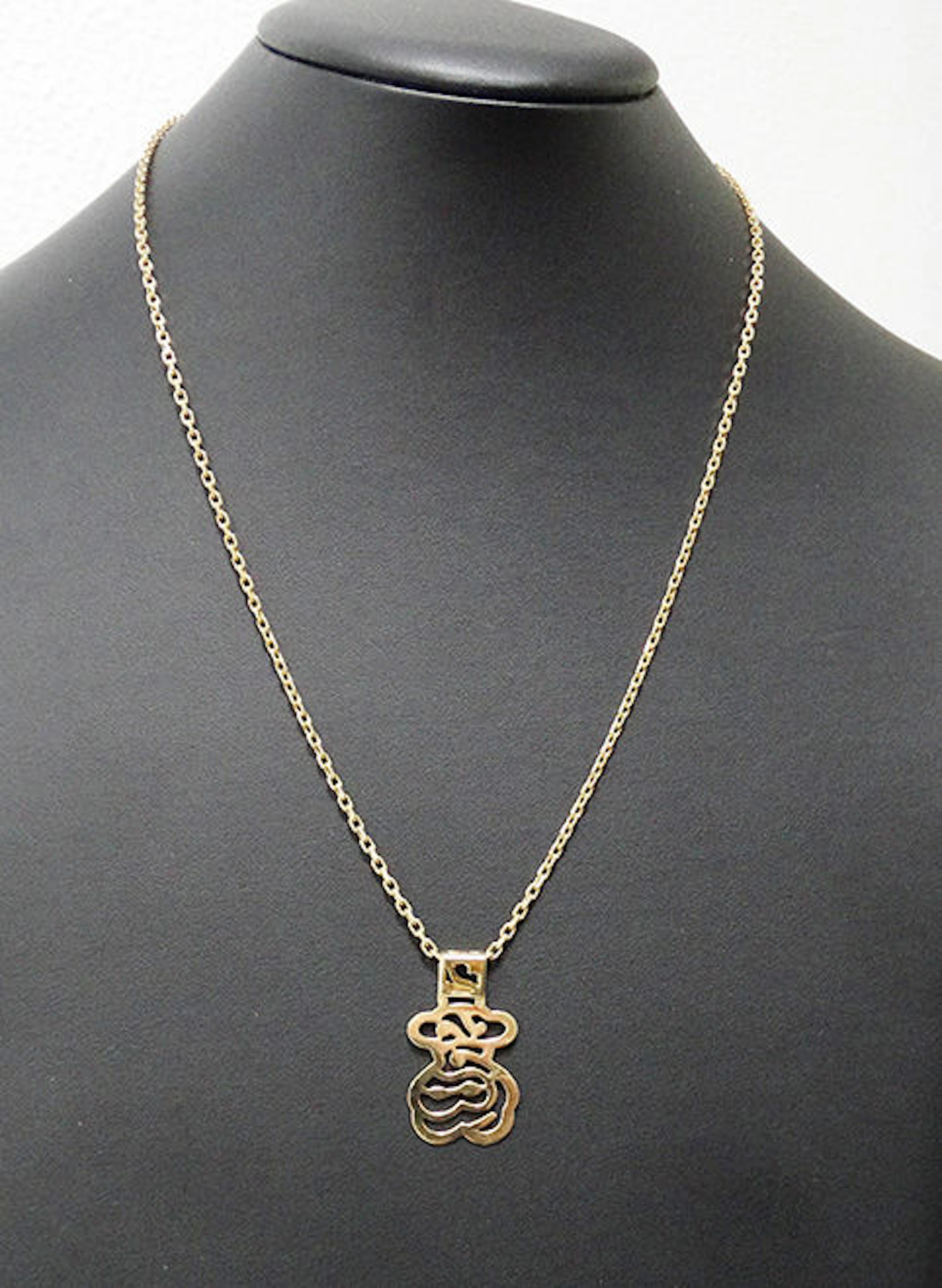 Gold necklace with Tous pendant