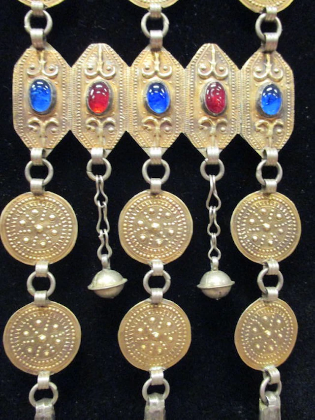 Yomud (Turkmen) wedding jewellery - made of silver and has gold accents.
