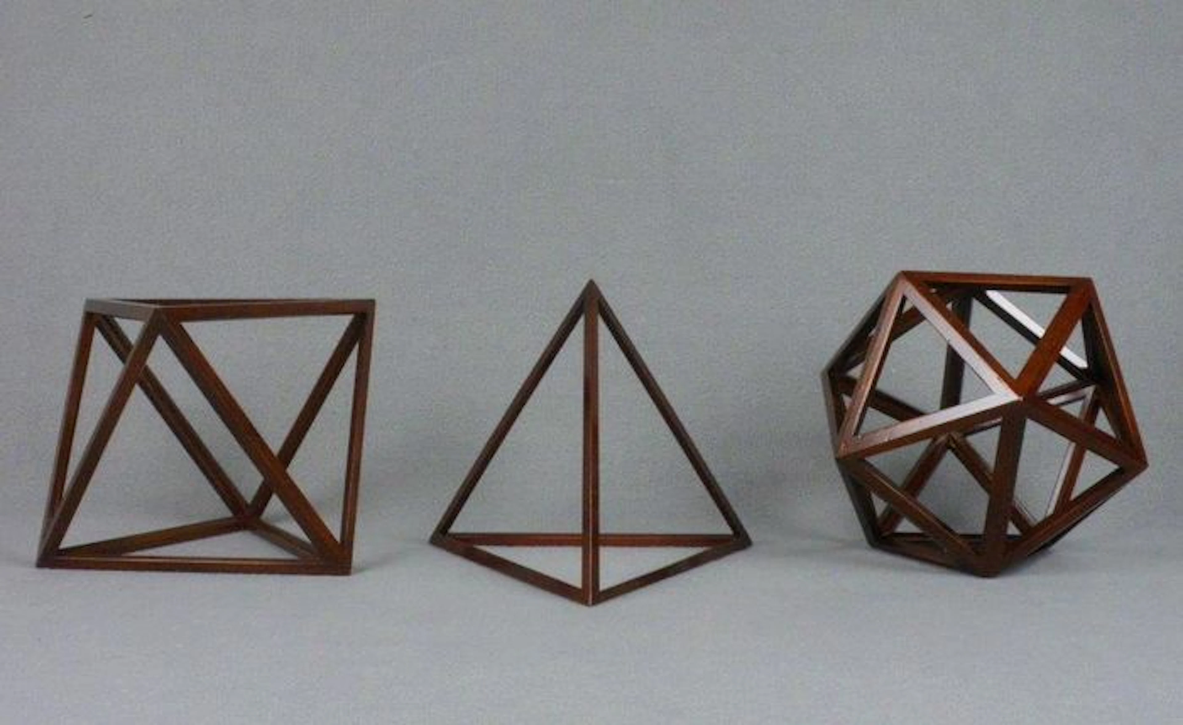 The elements fire, water, and air in mahogany wood - 21st century