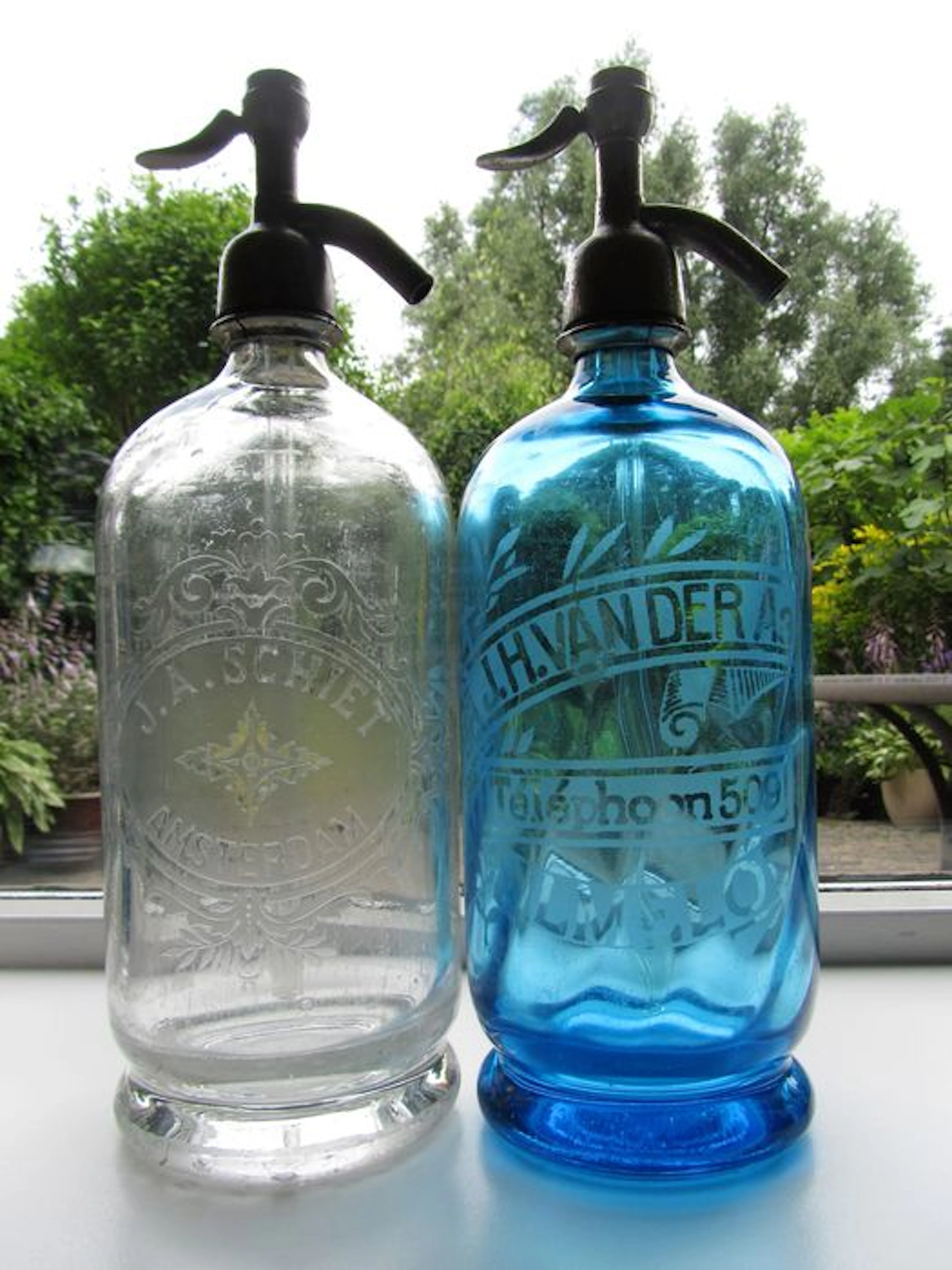 Two original, undamaged Dutch siphons / wash bottles / spray water bottles