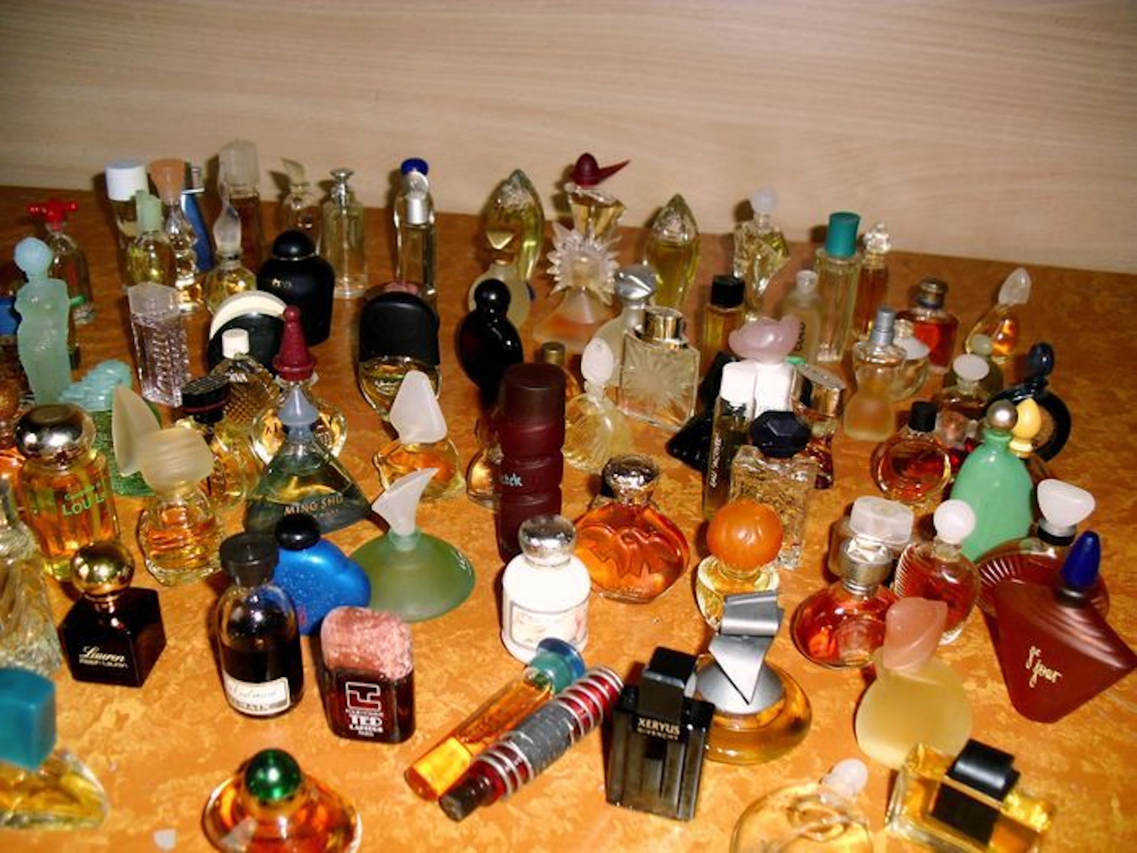 Collection of 95 vintage miniature perfume bottles