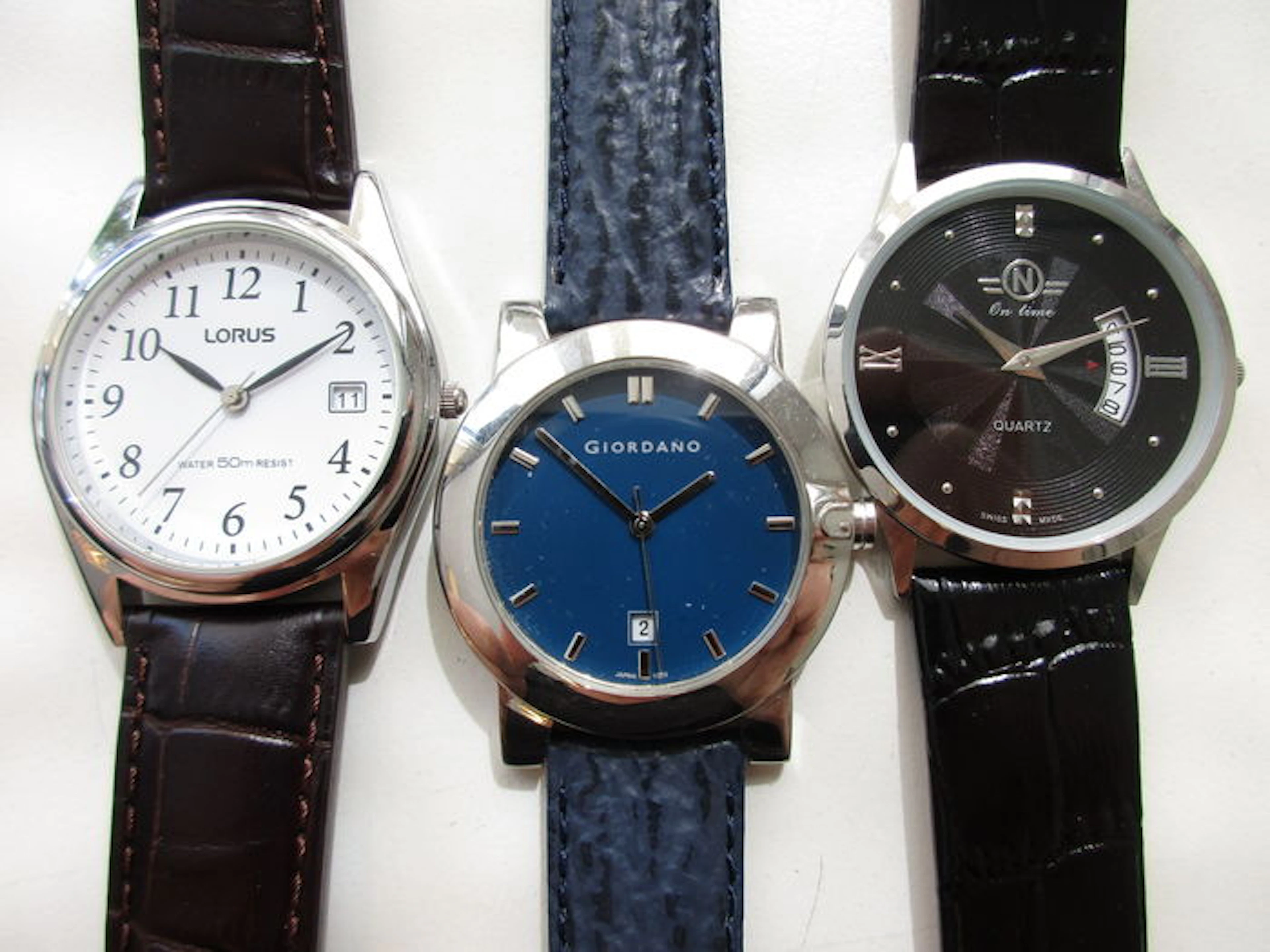 Set of 3 Lorus / Giordano / On Time – men's wristwatches – circa 2012