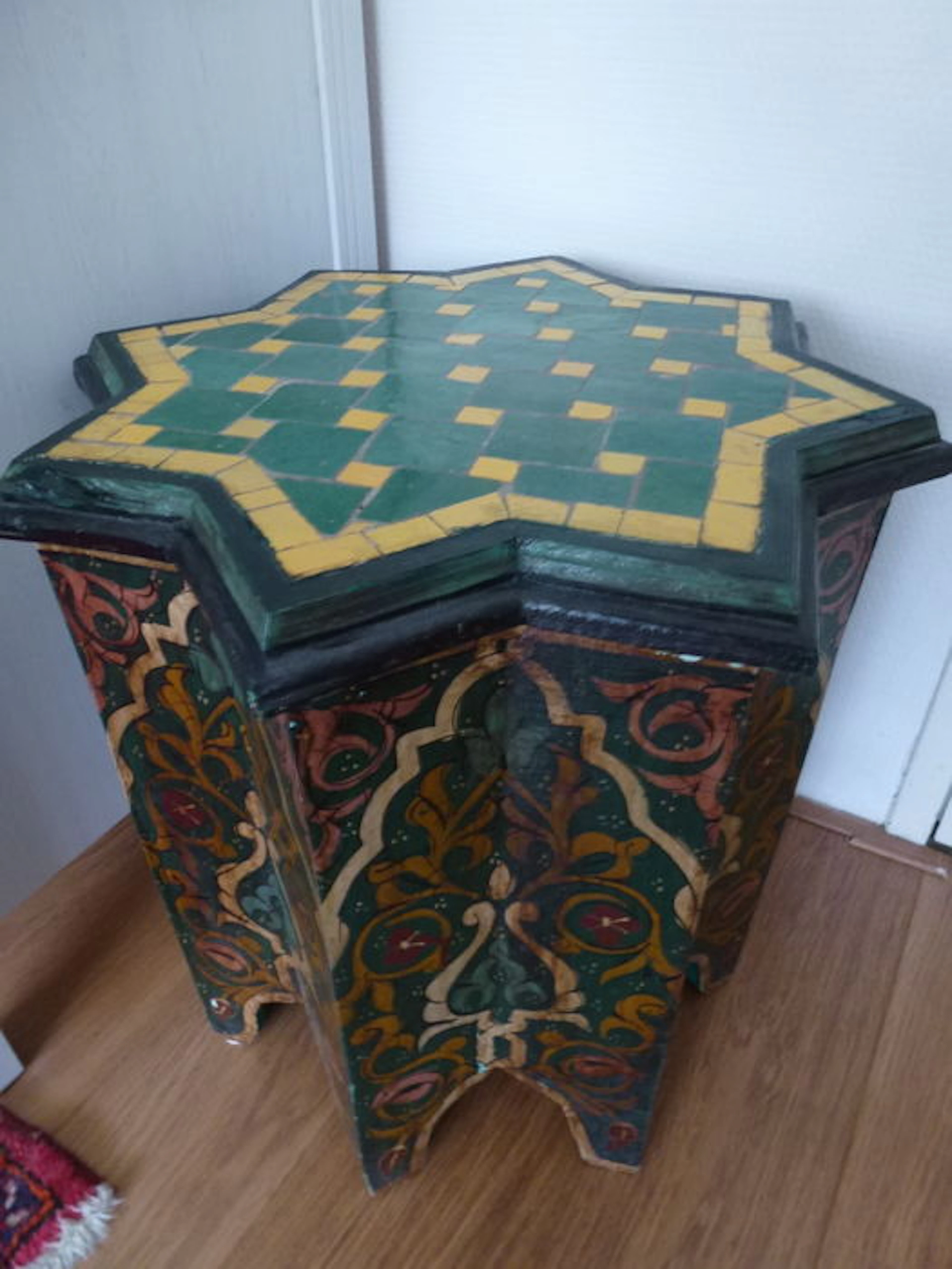 Handmade oriental table, with star-shaped mosaic top.