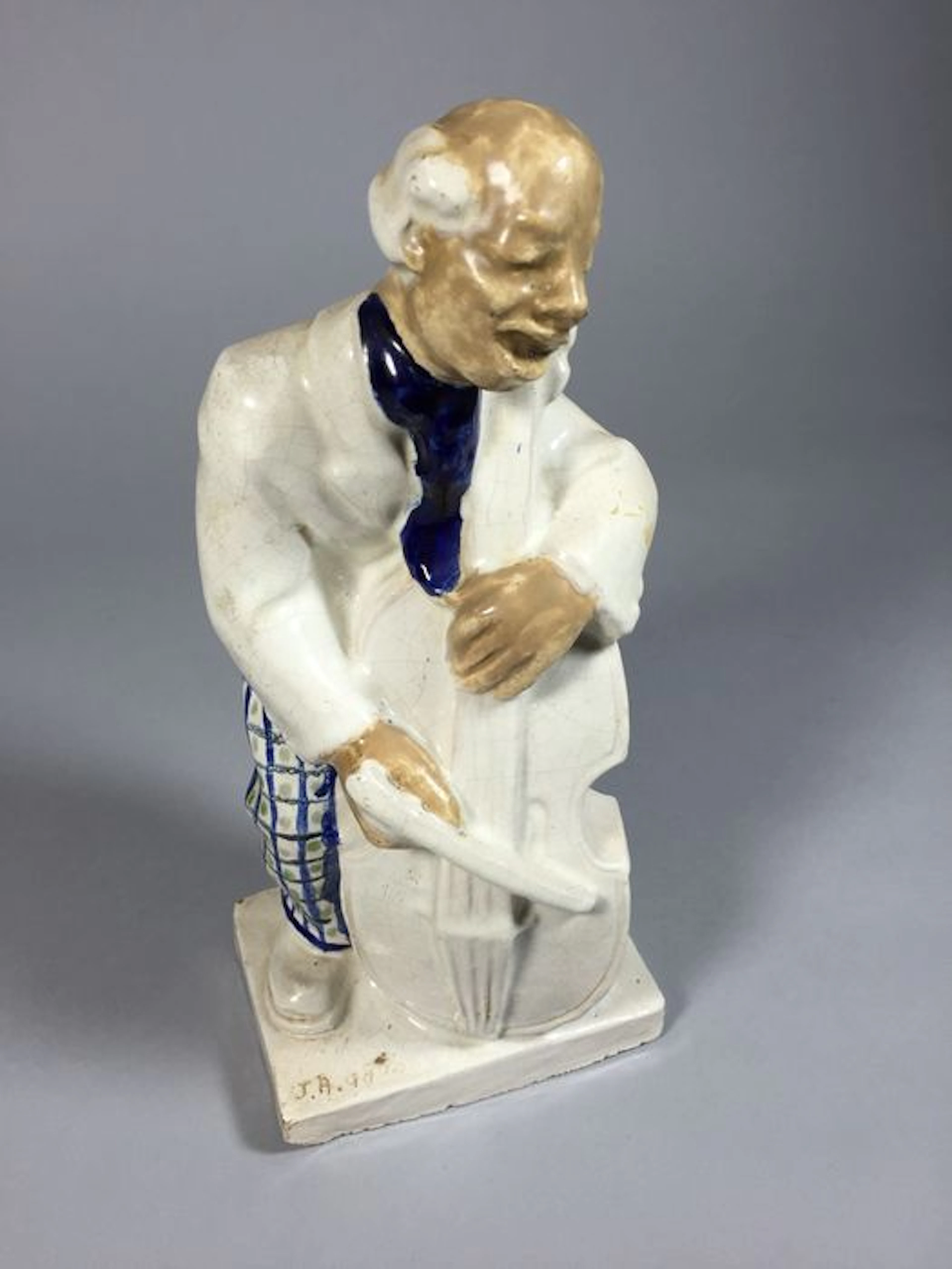 J.A. Gause (1910-1988) - ceramic sculpture of cello player