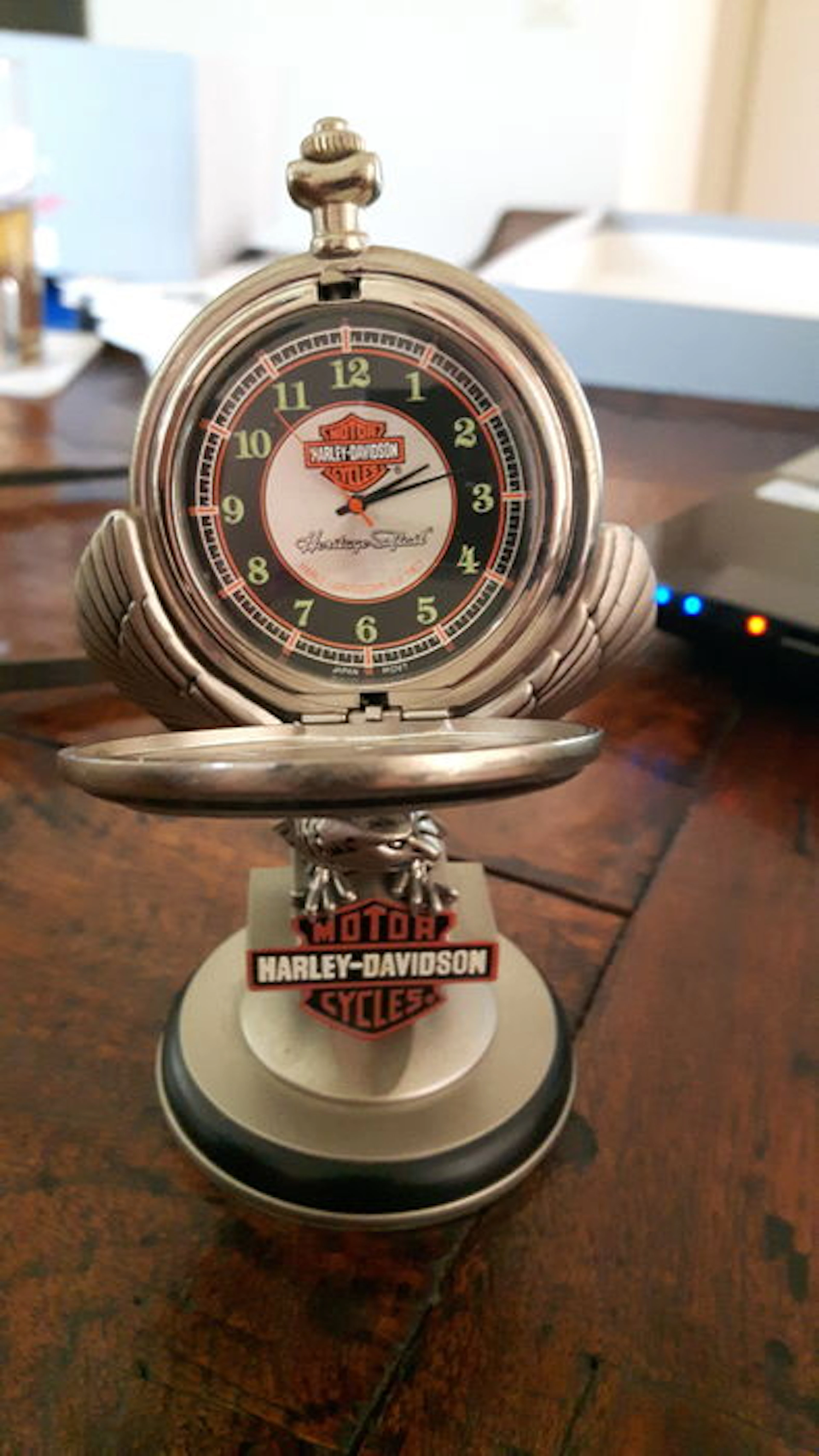 Franklin Mint - Harley Davidson Heritage Softail pocket watch with eagle stand.