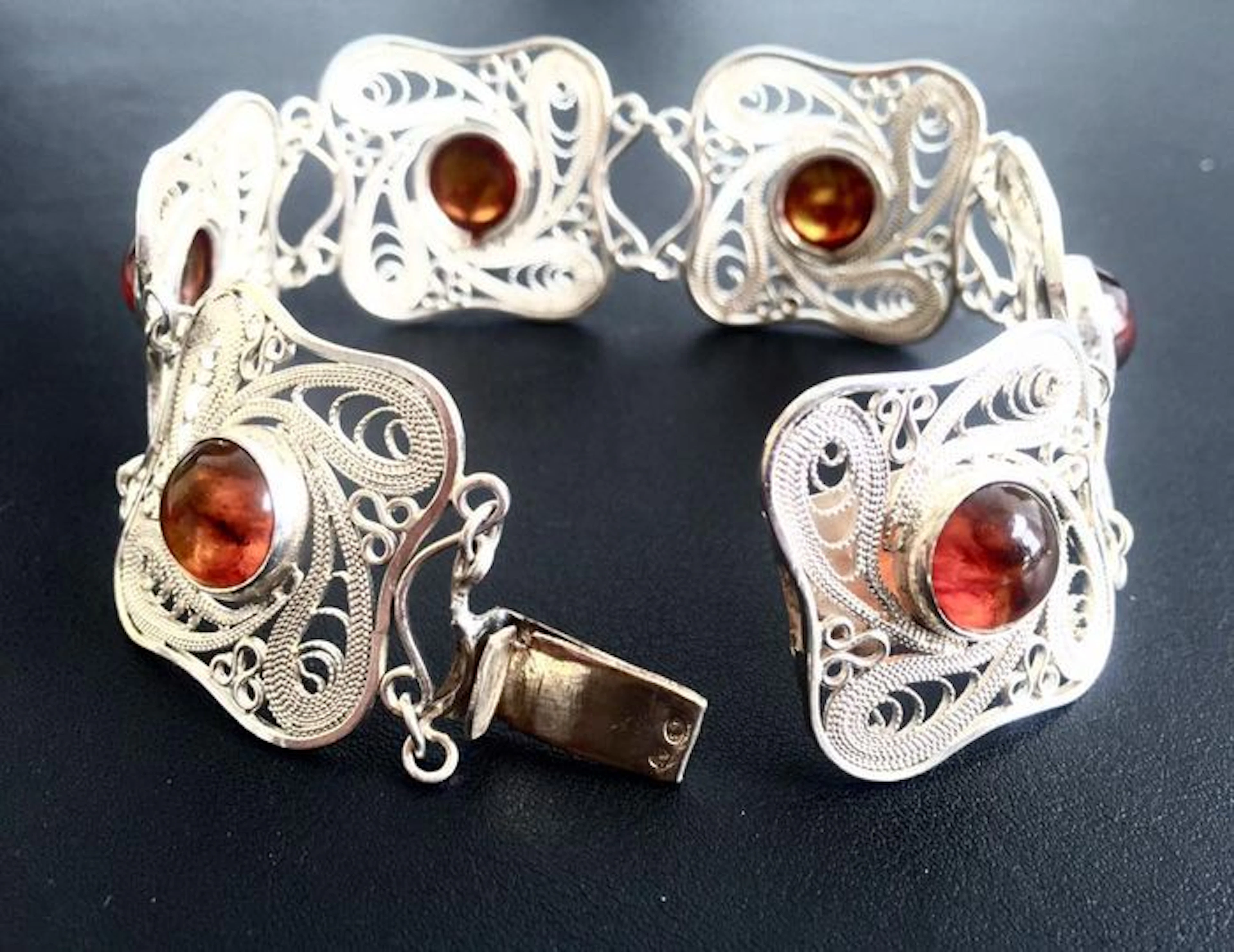 Silver bracelet with amber, 835k