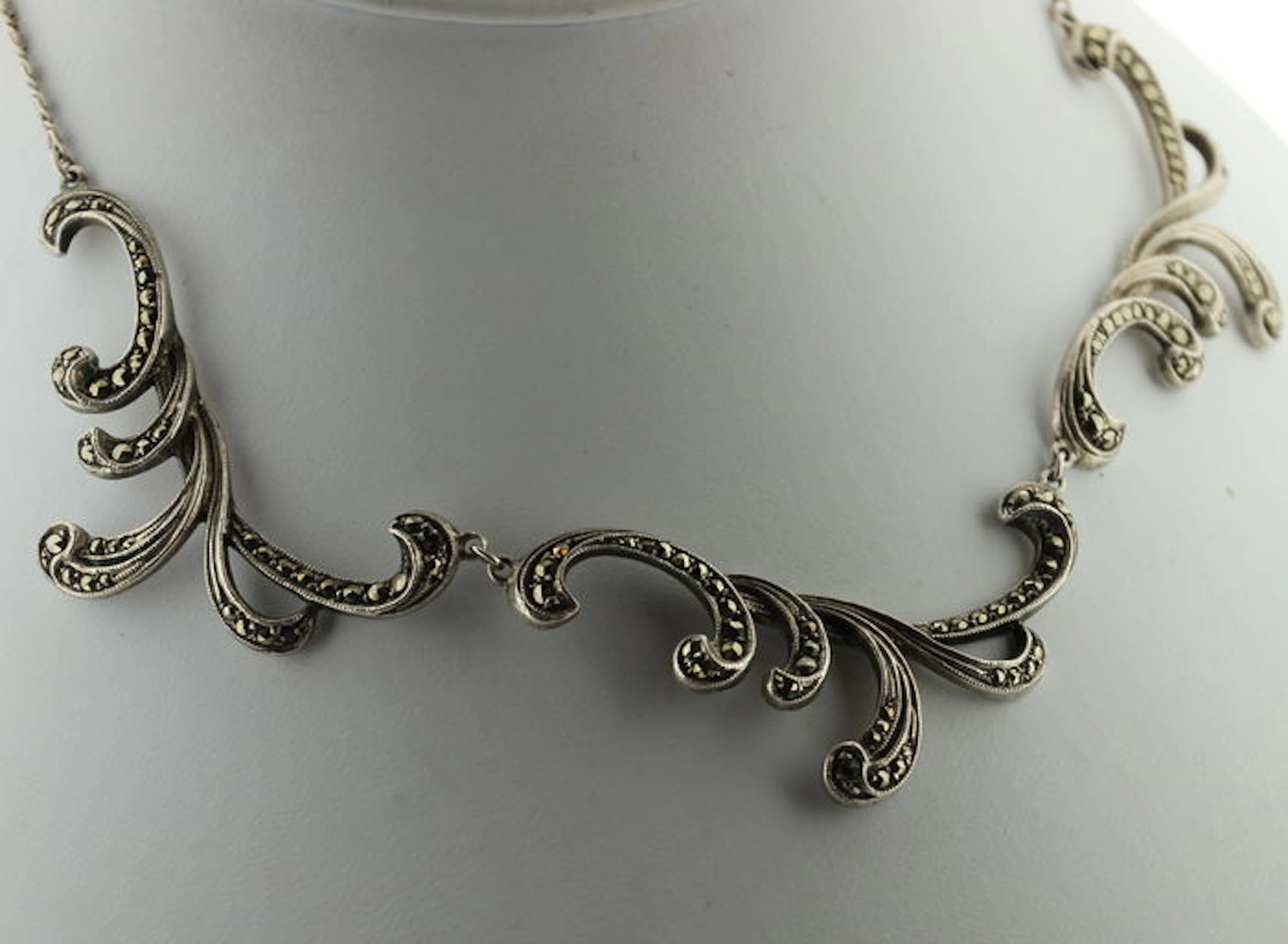 Silver necklace inlaid with marcasite.
