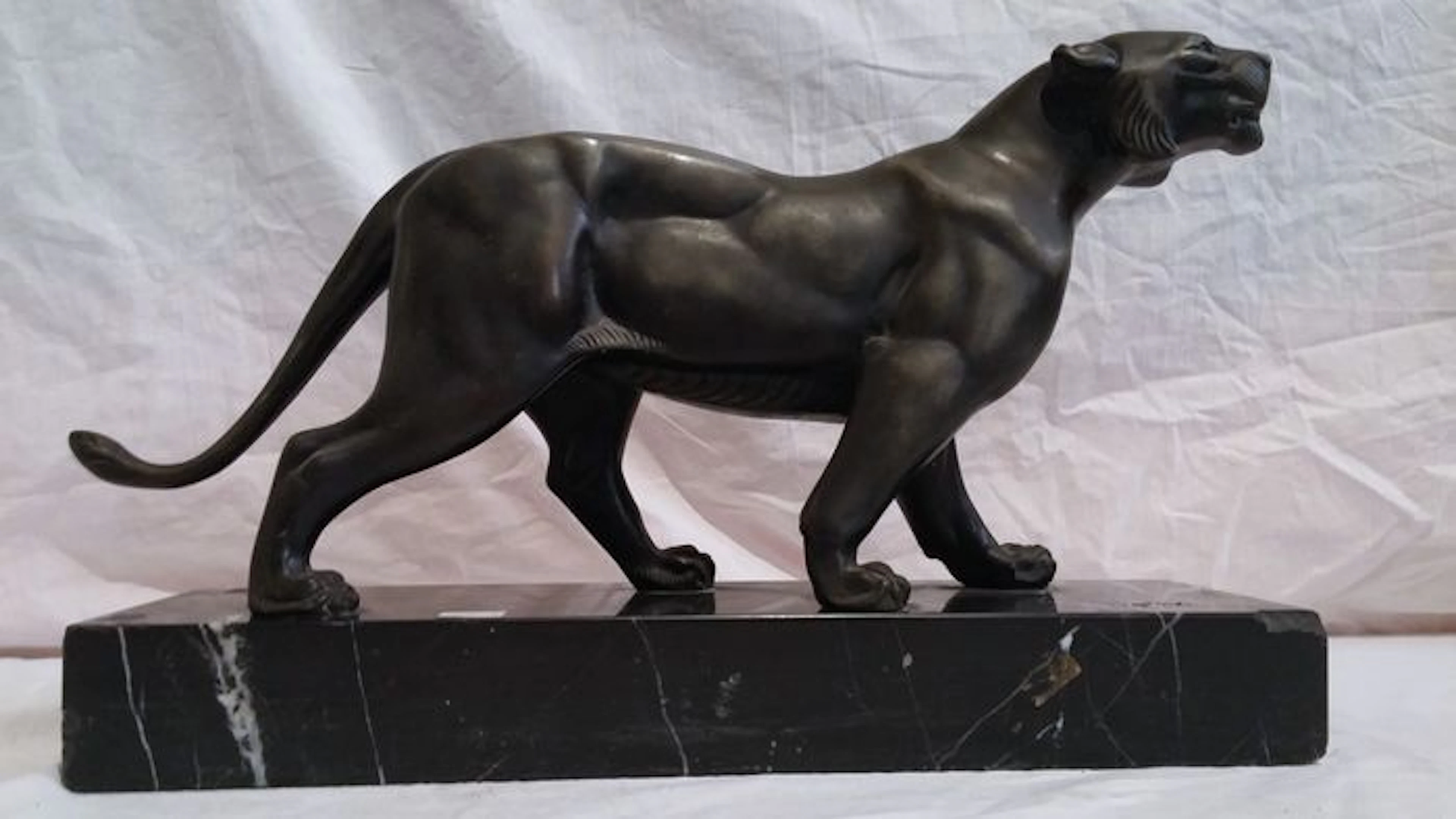 Art deco sculpture in antimony with black marble base