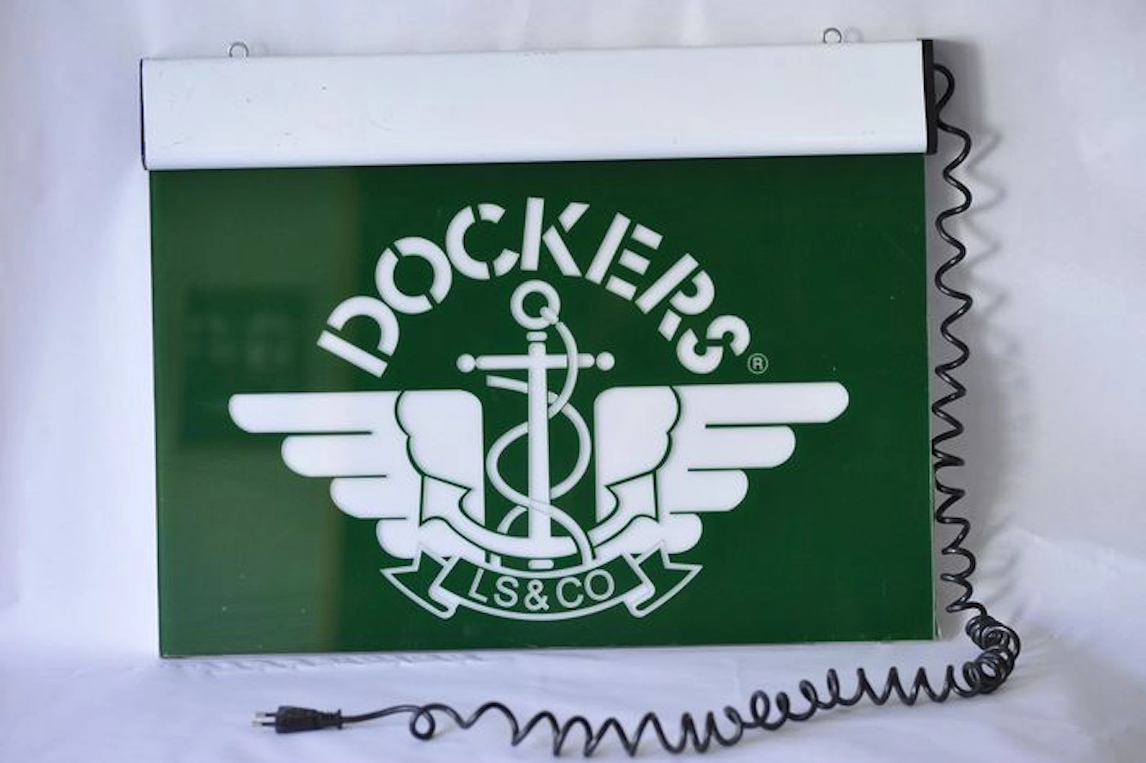 Cartel luminoso Dockers. Finales siglo XX