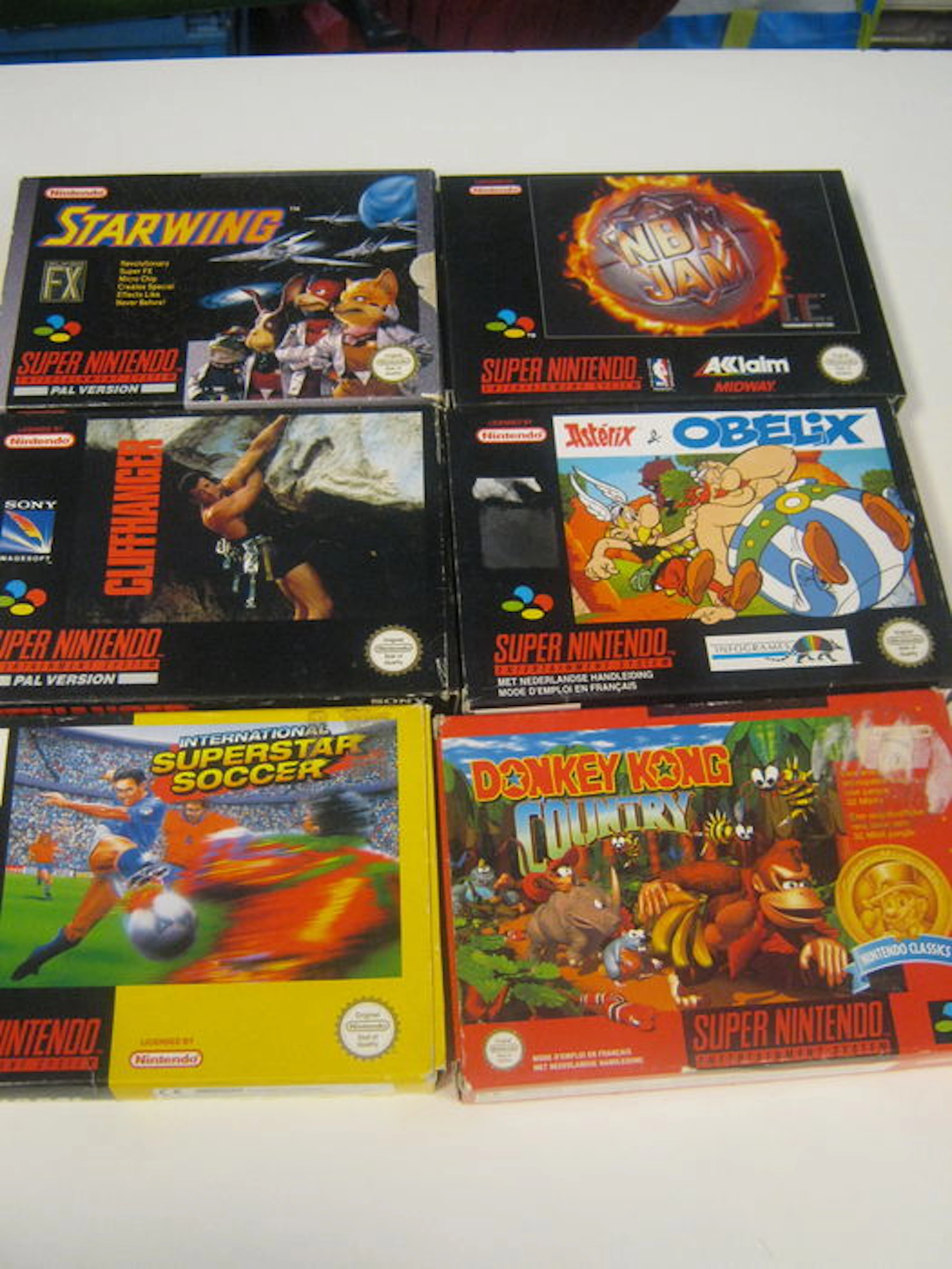 Lot of 6 SNES games, all complete in box - Starwing, Donkey Kong Country, Cliffhanger, etc