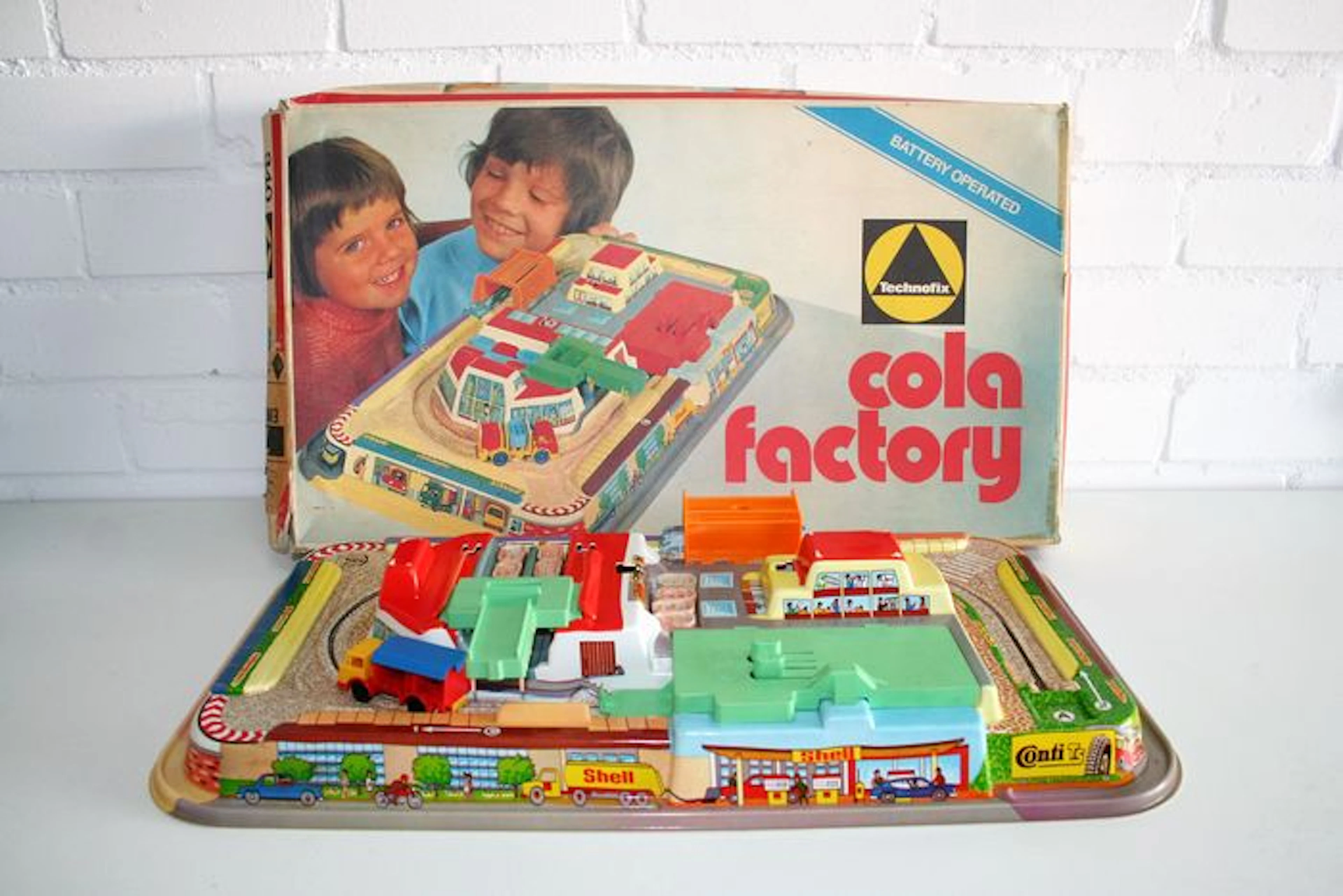 Technofix, West Germany - Length 56 cm - Plastic Cola Factory GE-340 with battery motor, 70s