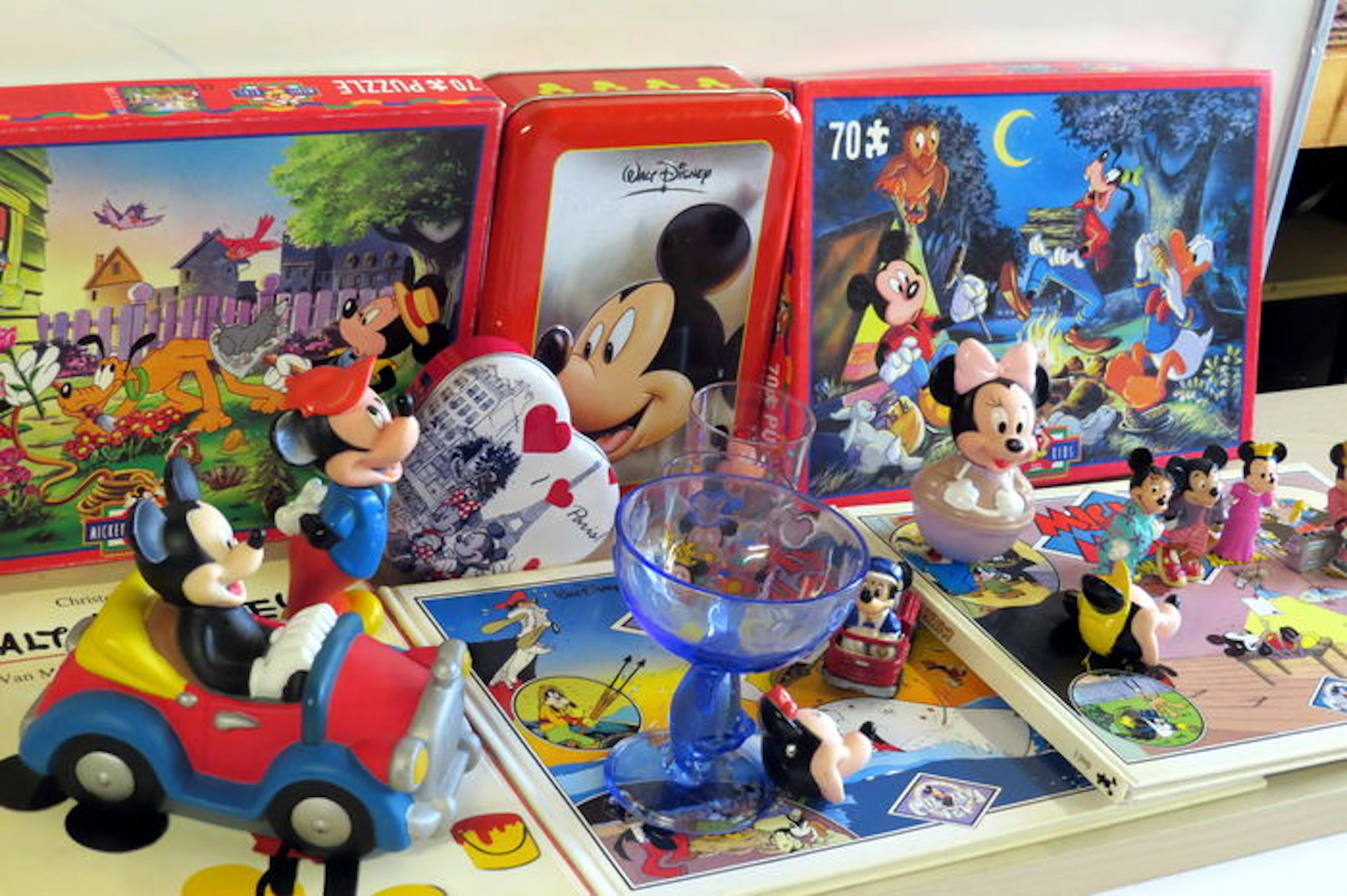 Mickey Mouse - 3 albums (2 x hc/ 1x sc) - 2 puzzles - goblet - piggy bank - MM Fire Engine - synthetic statutes et al(1975/1988)