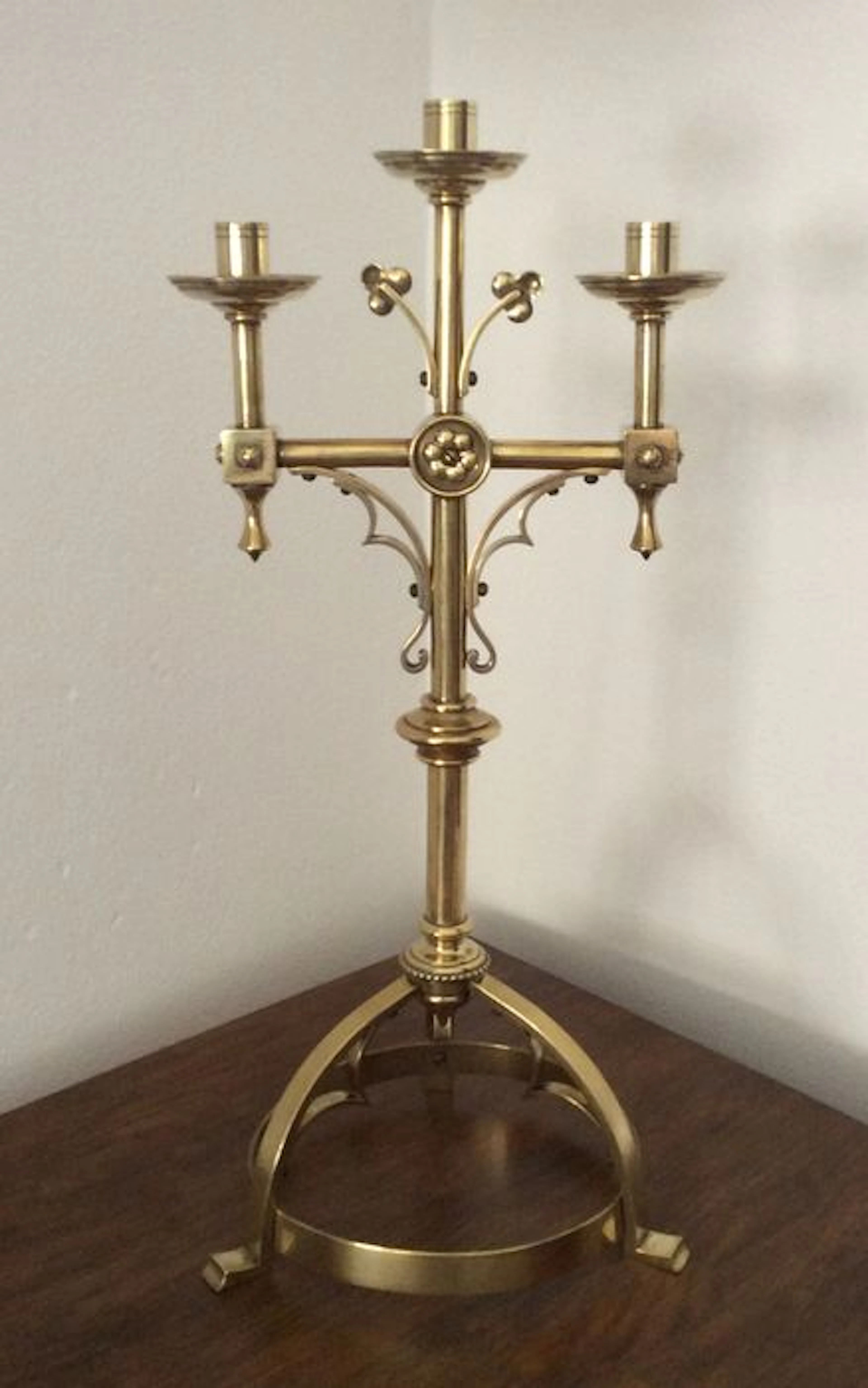 A gilded copper church candle holder in Neogothic style with cross motif, Belgium - France, ± 1900