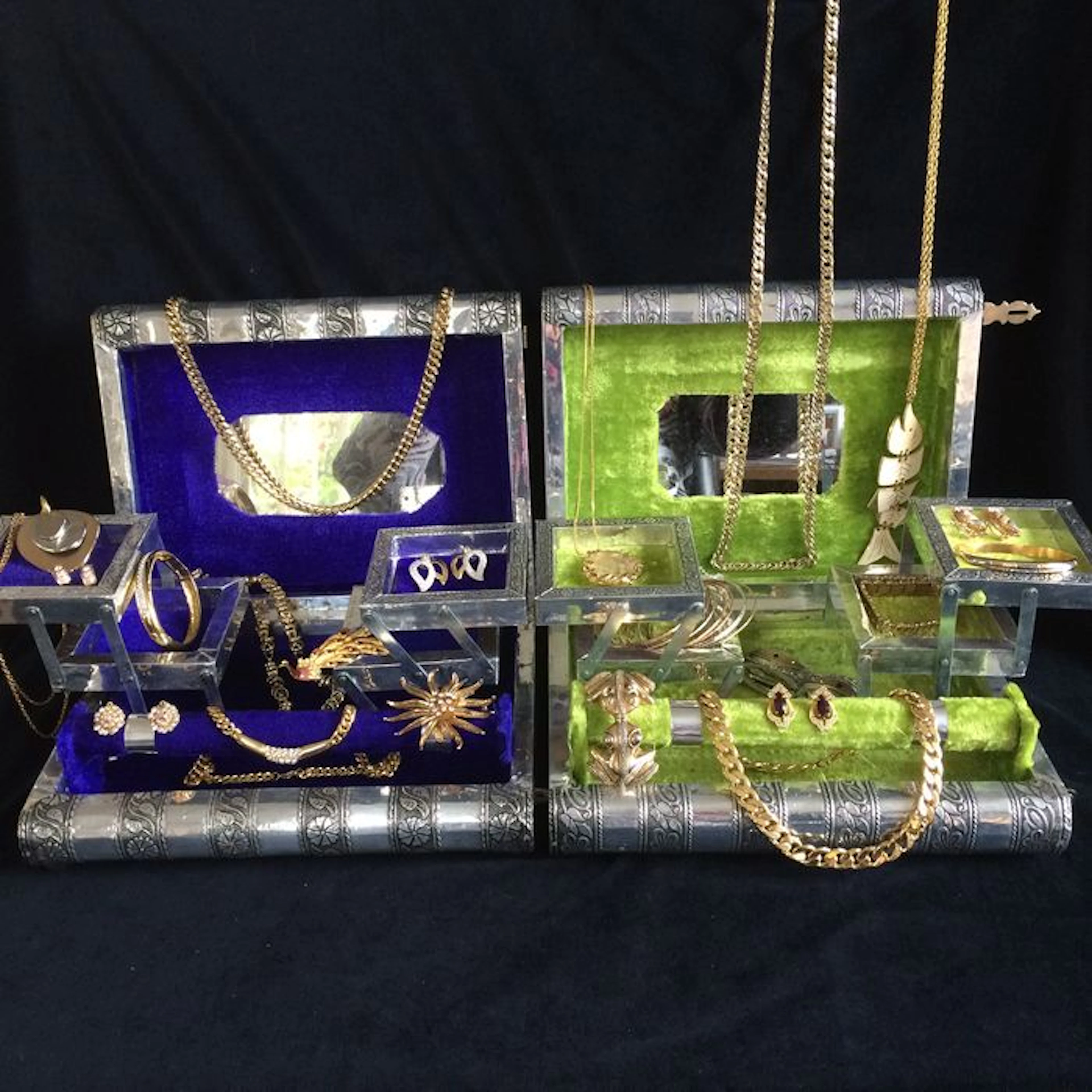 2 jewelry boxes, wood, aluminum, filled with jewelry.